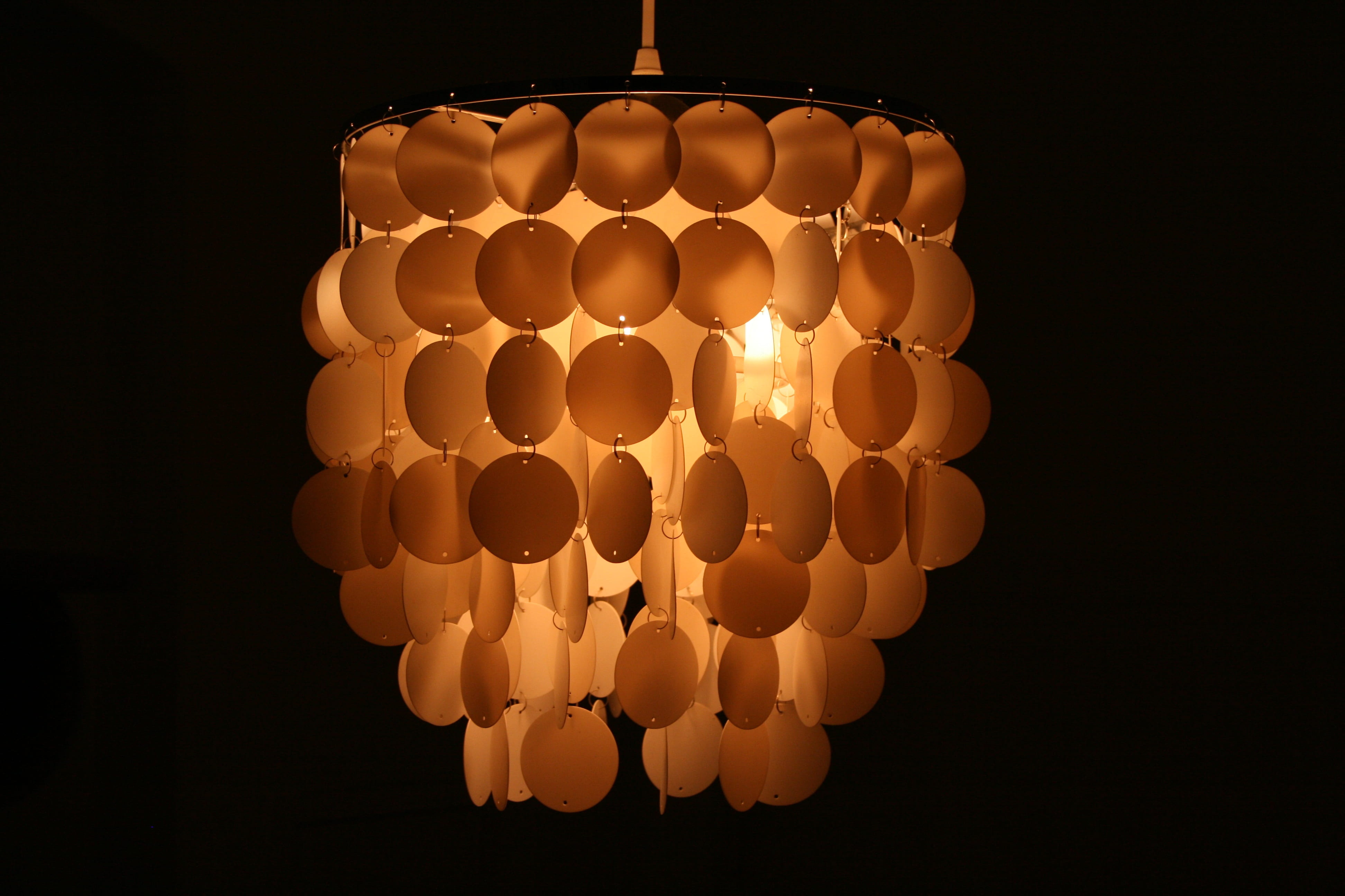lamp, light, shadow, black background, large group of objects
