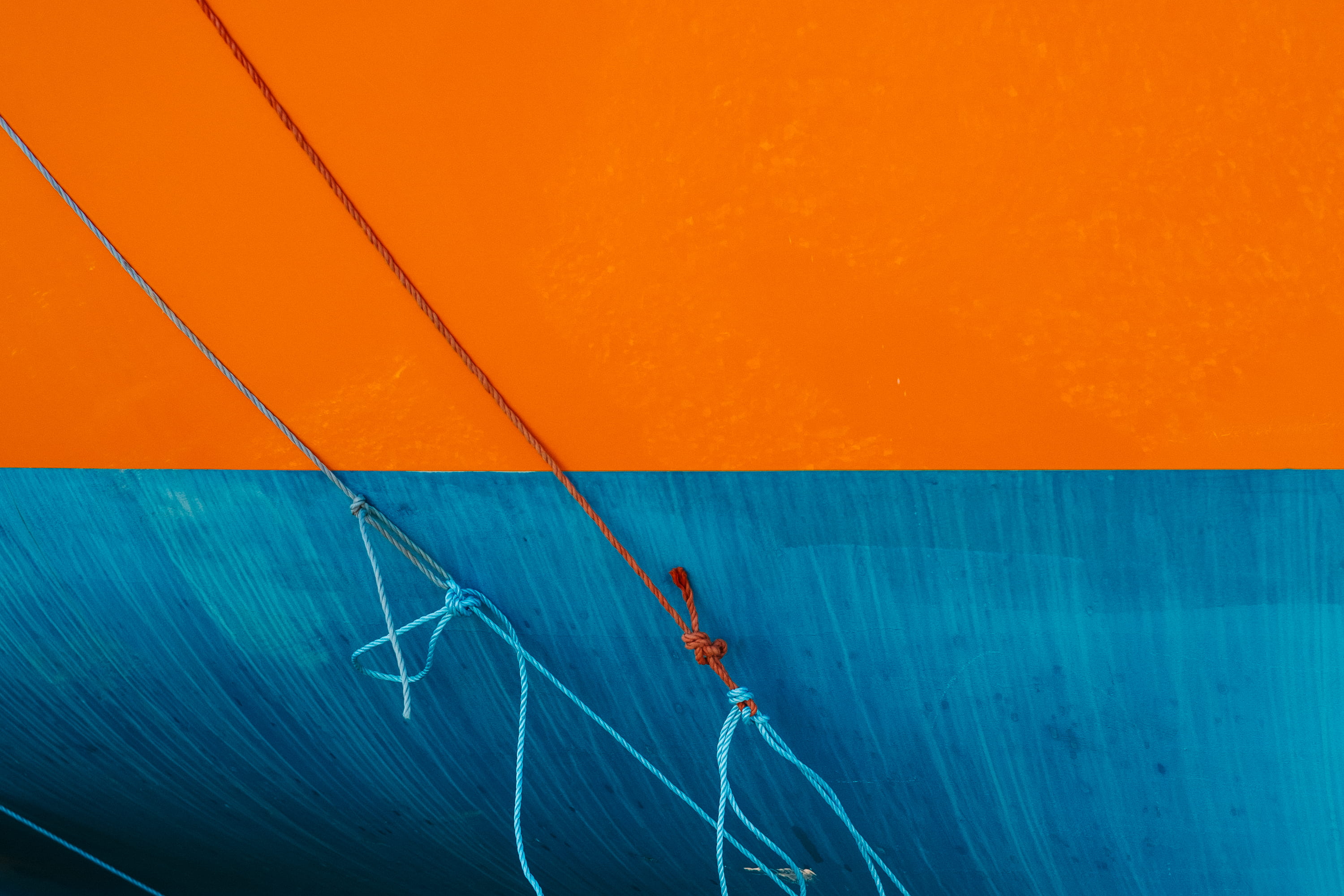 red and blue rope on blue and orange wall, boat, mood, colour