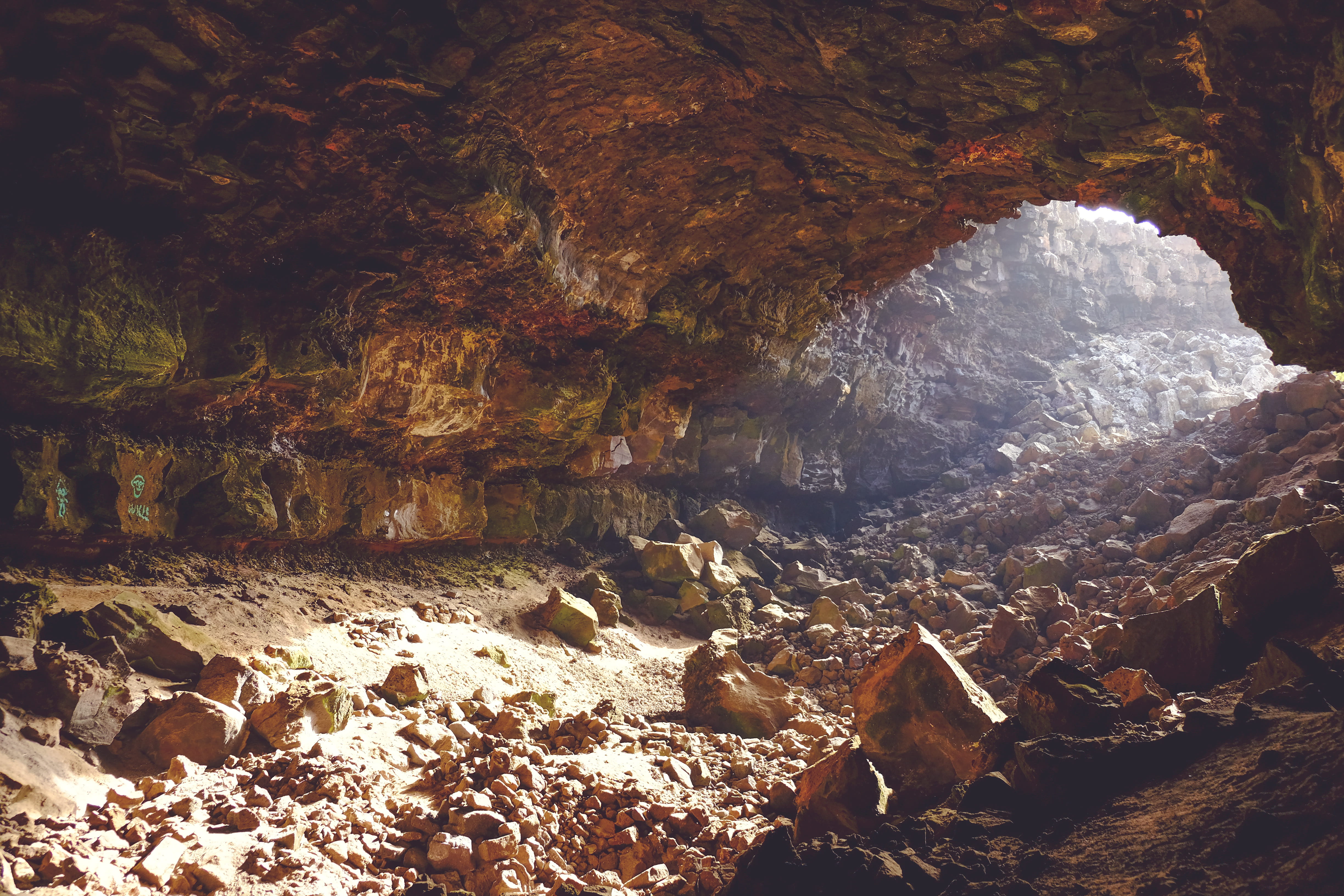 brown rock inside cave, brown cave at daytime, rock formation