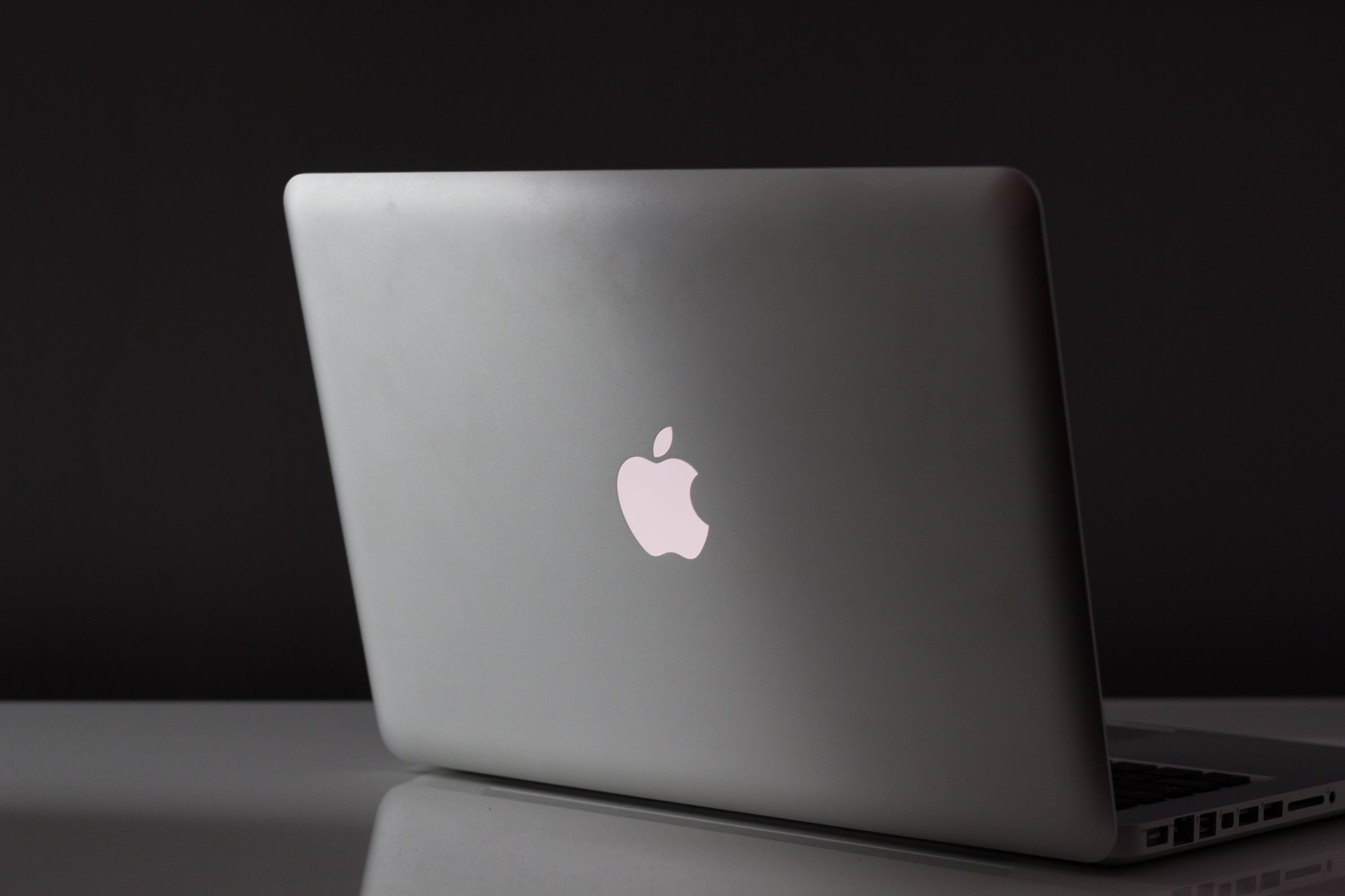 opened MacBook White on white table top, laptop, computer, technology