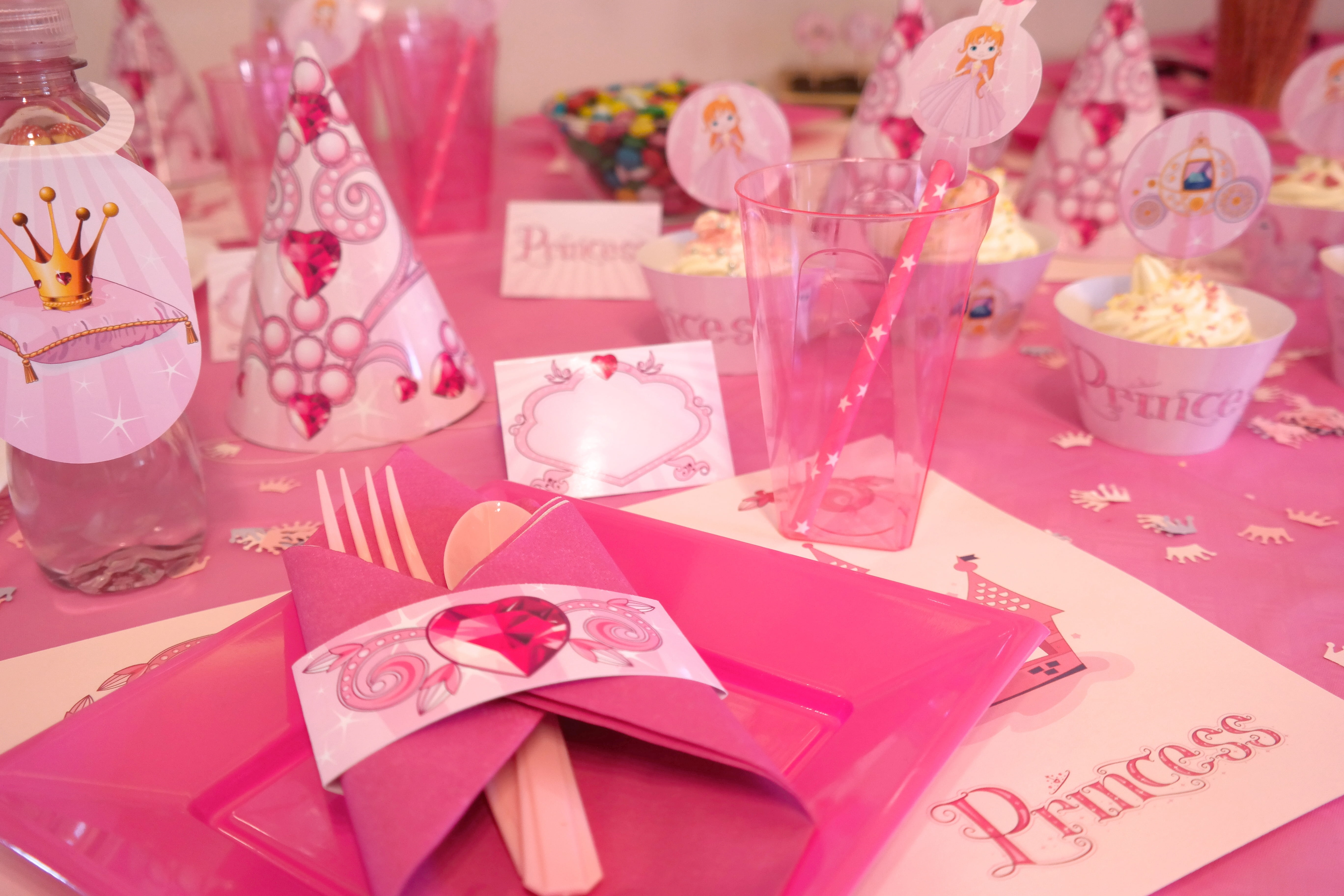 pink-themed birthday decors on table, the adoption of, party