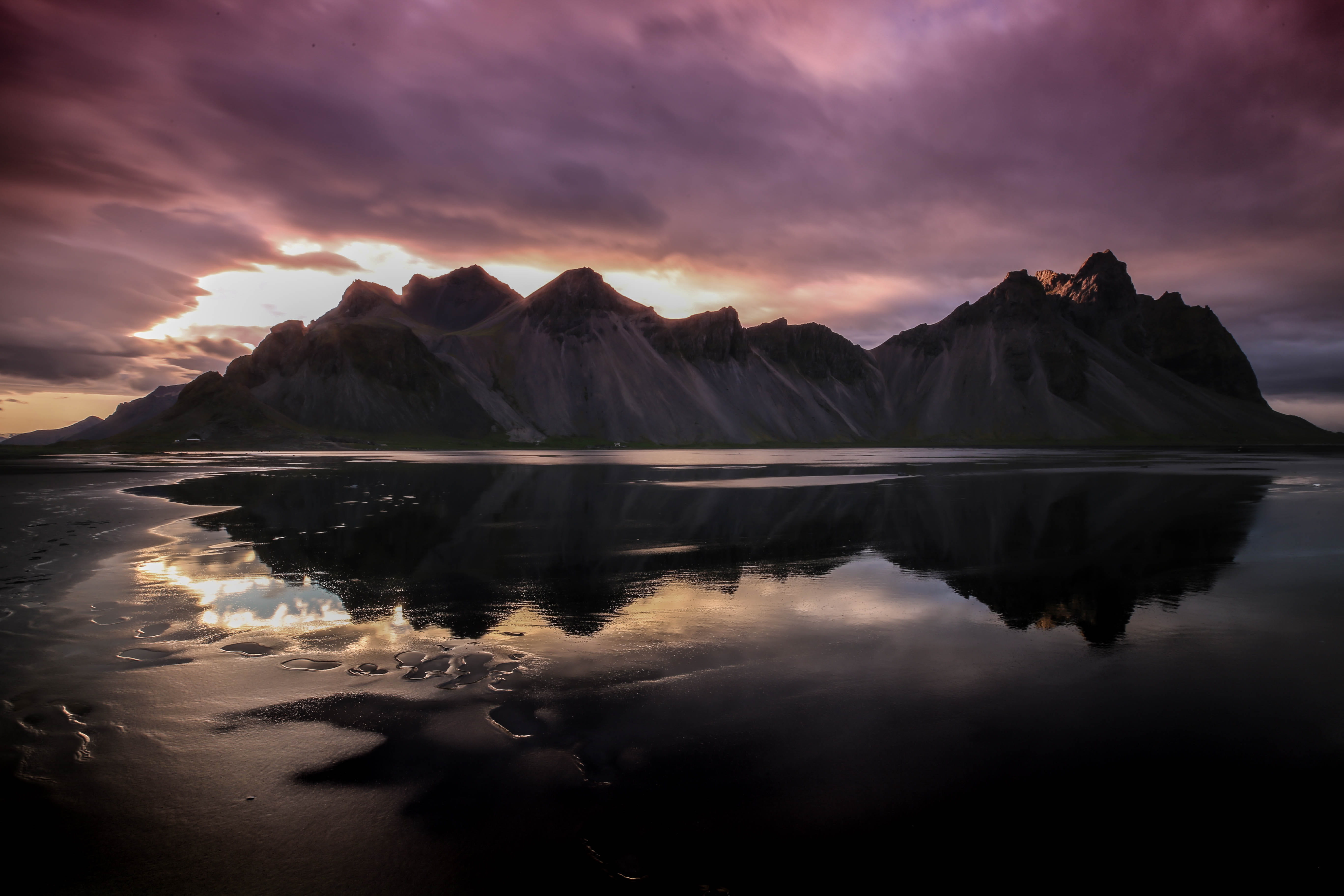mountains reflecting on body of water, Black Sand Beach Summer Solstice Sunset Iceland