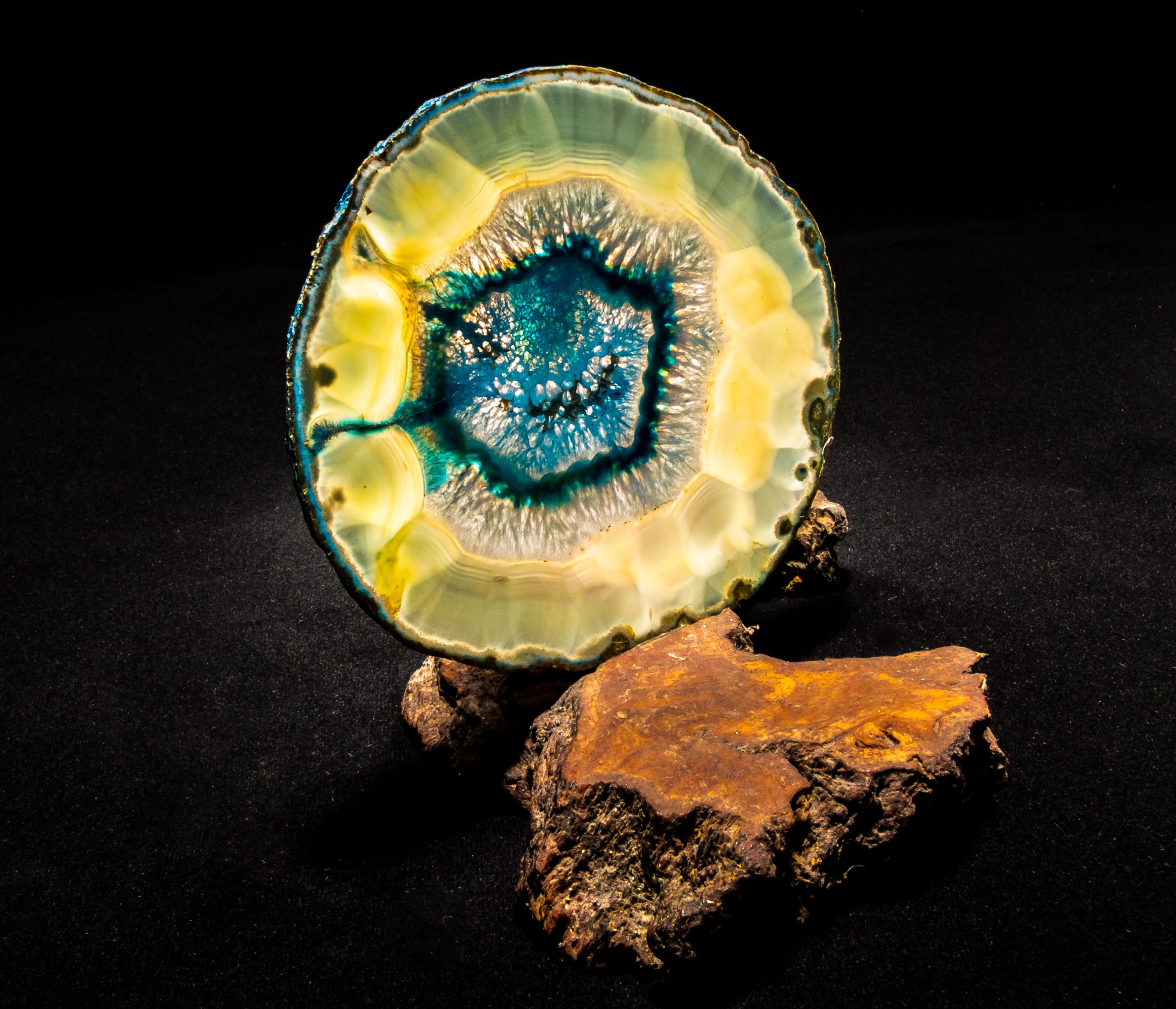 agate slice, blue, close, light, single object, black background