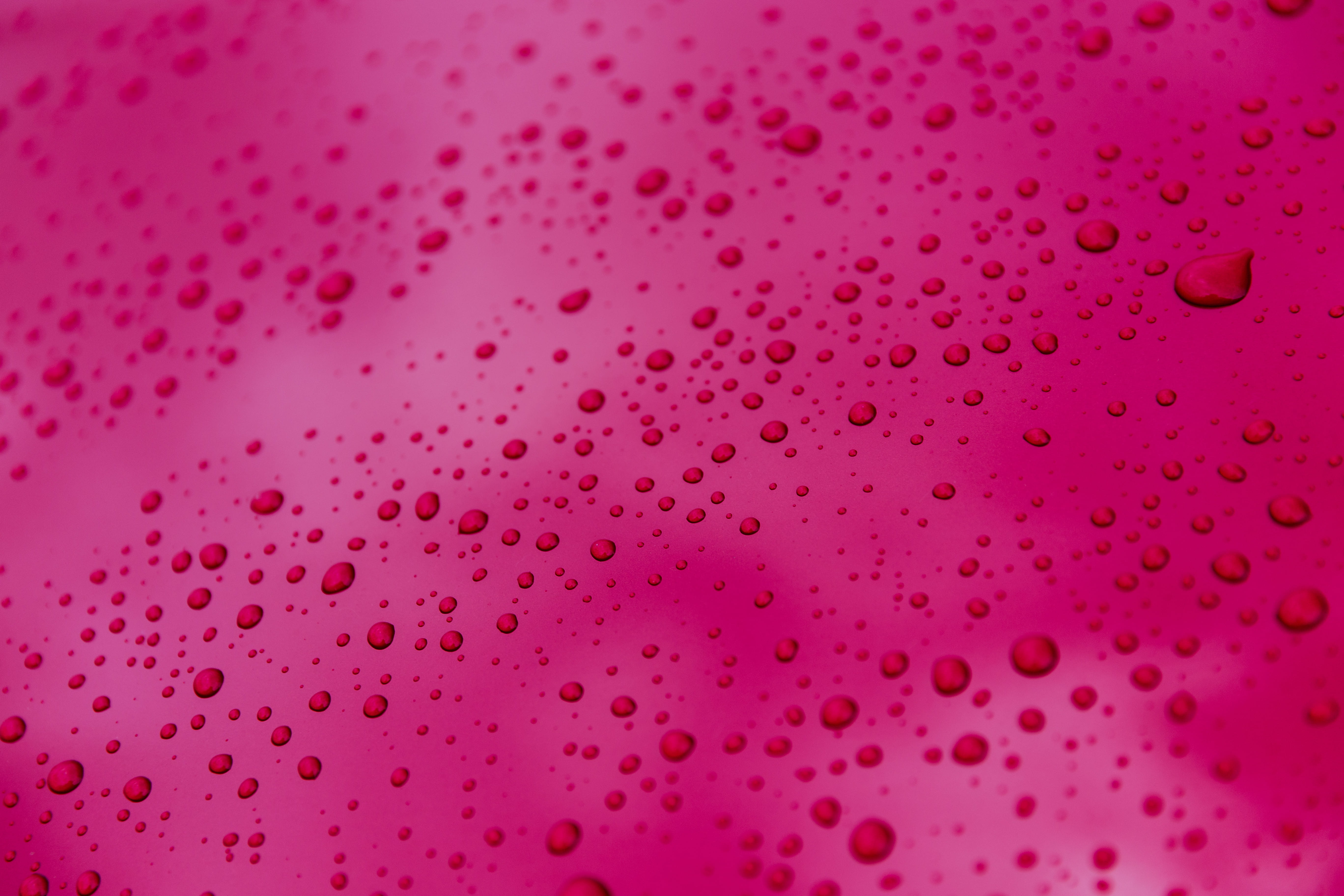 Close-up shot of fresh rain drops on a metal texture, this image was captured with a Canon 6D DSLR