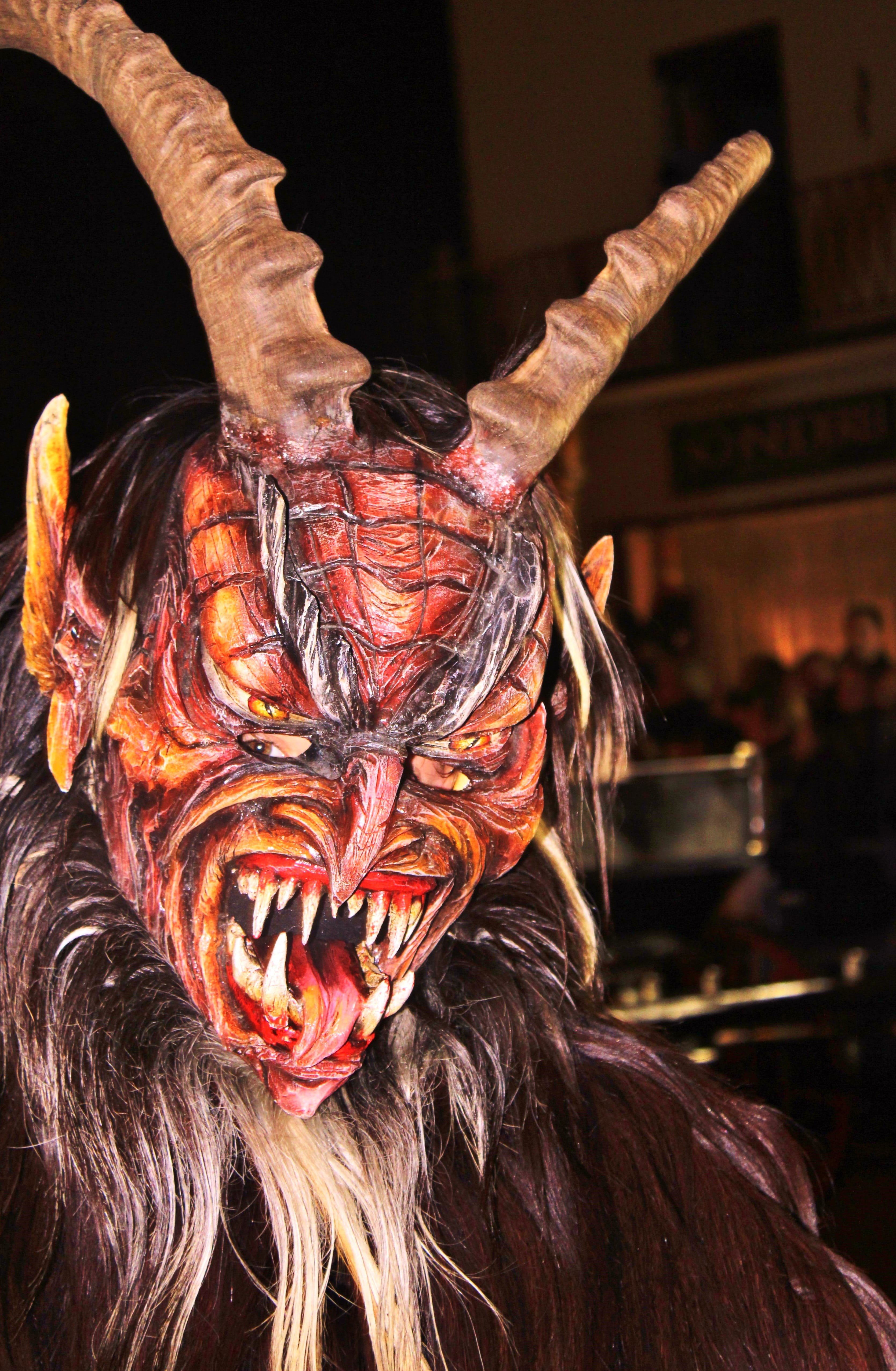 mask, panel, facemask, carnival, devil, real people, focus on foreground