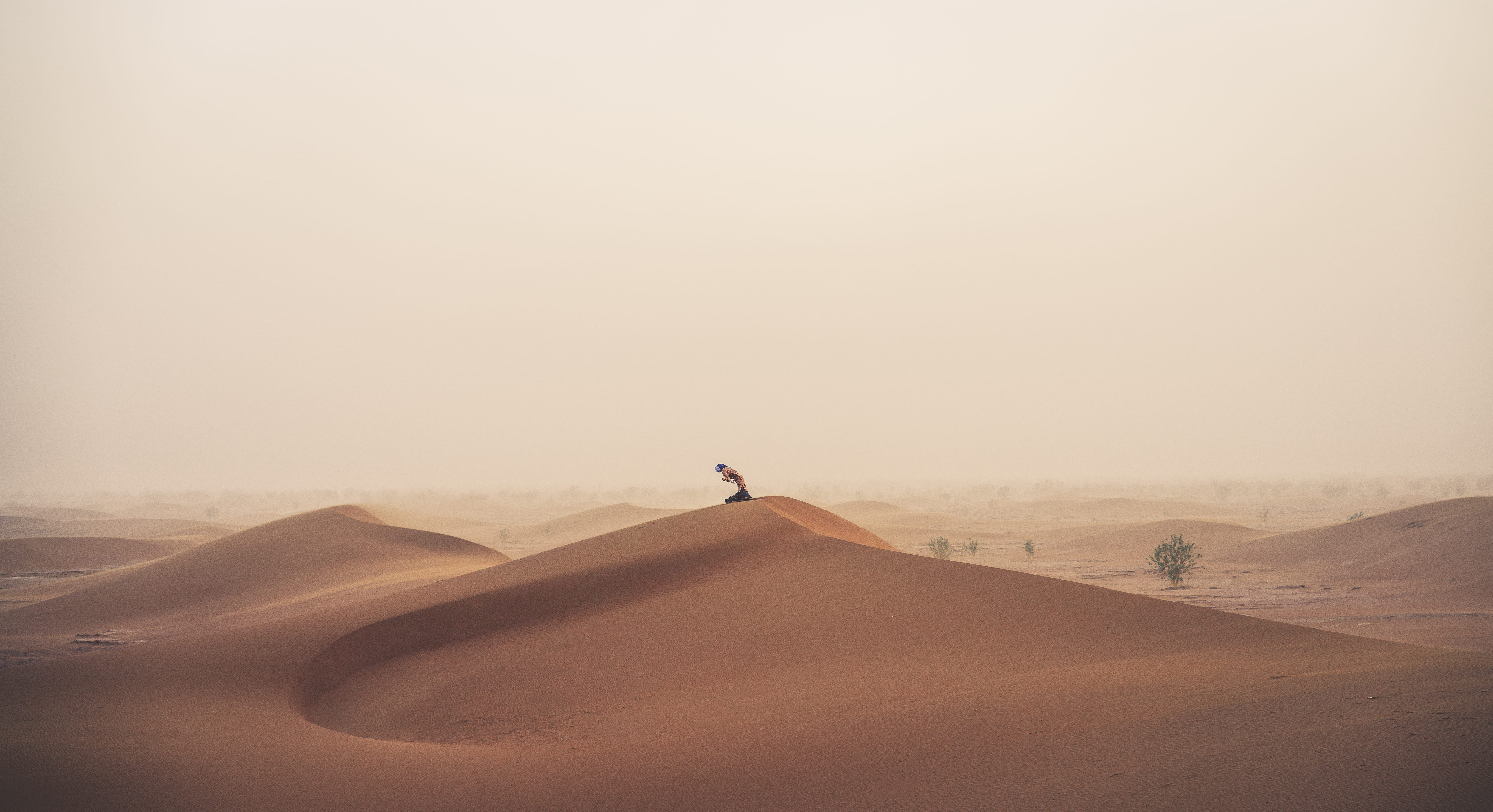 person standing on hill dessert, sand, yoga, prayer, faith, desert