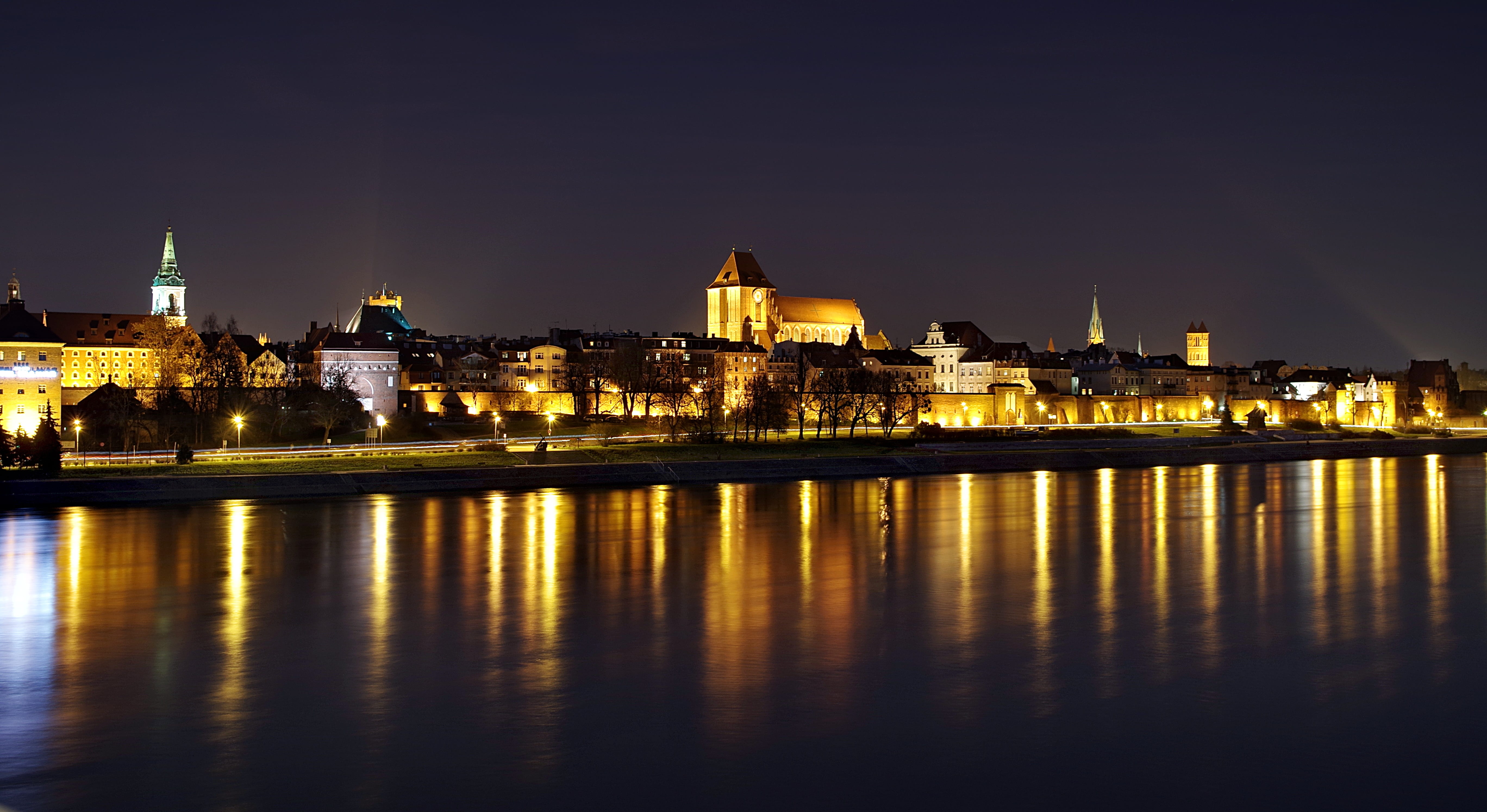 lighted city near body of water, toruń, panorama, night, the old town