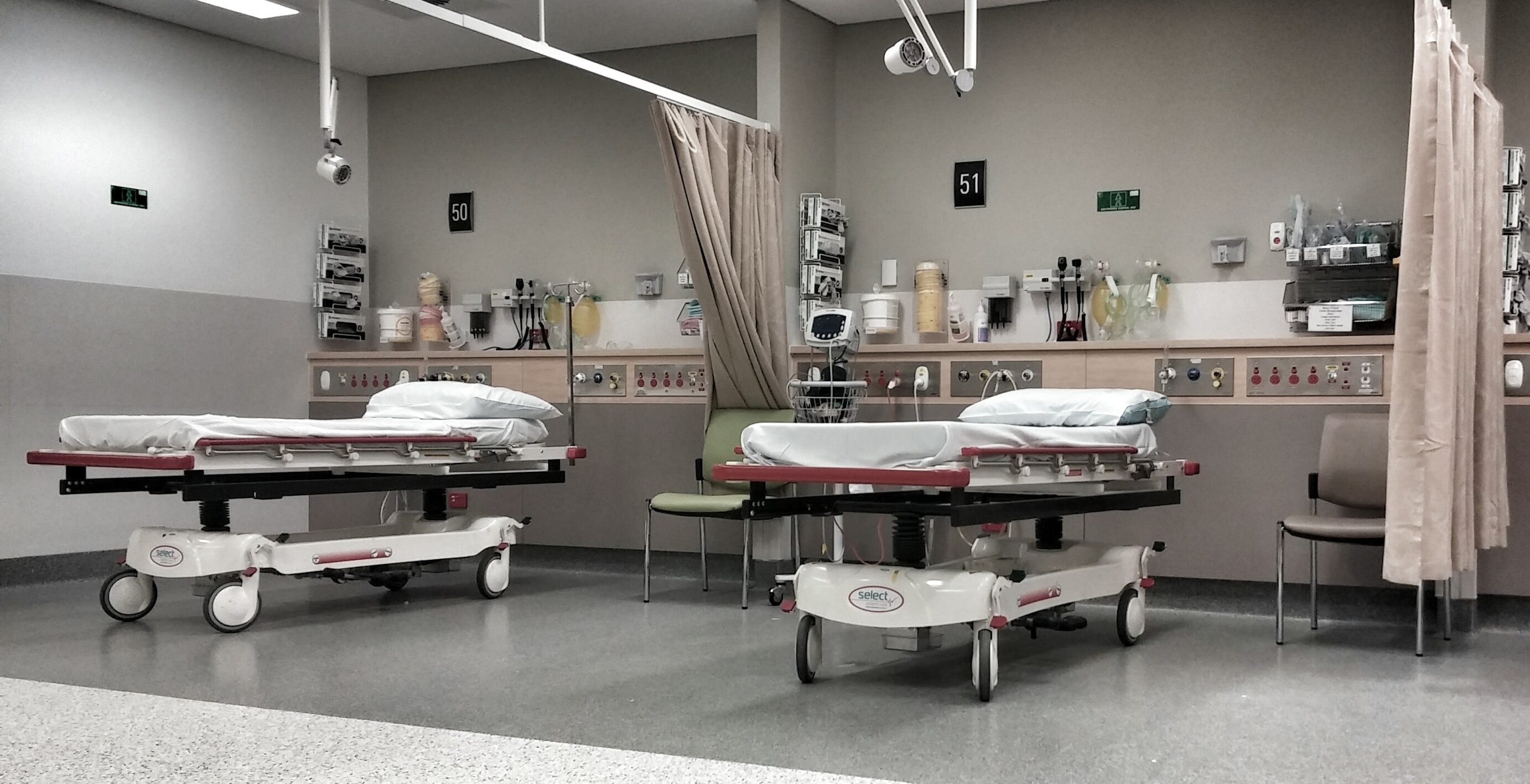 two white hospital beds inside medical room, a e, emergency, hospital ward