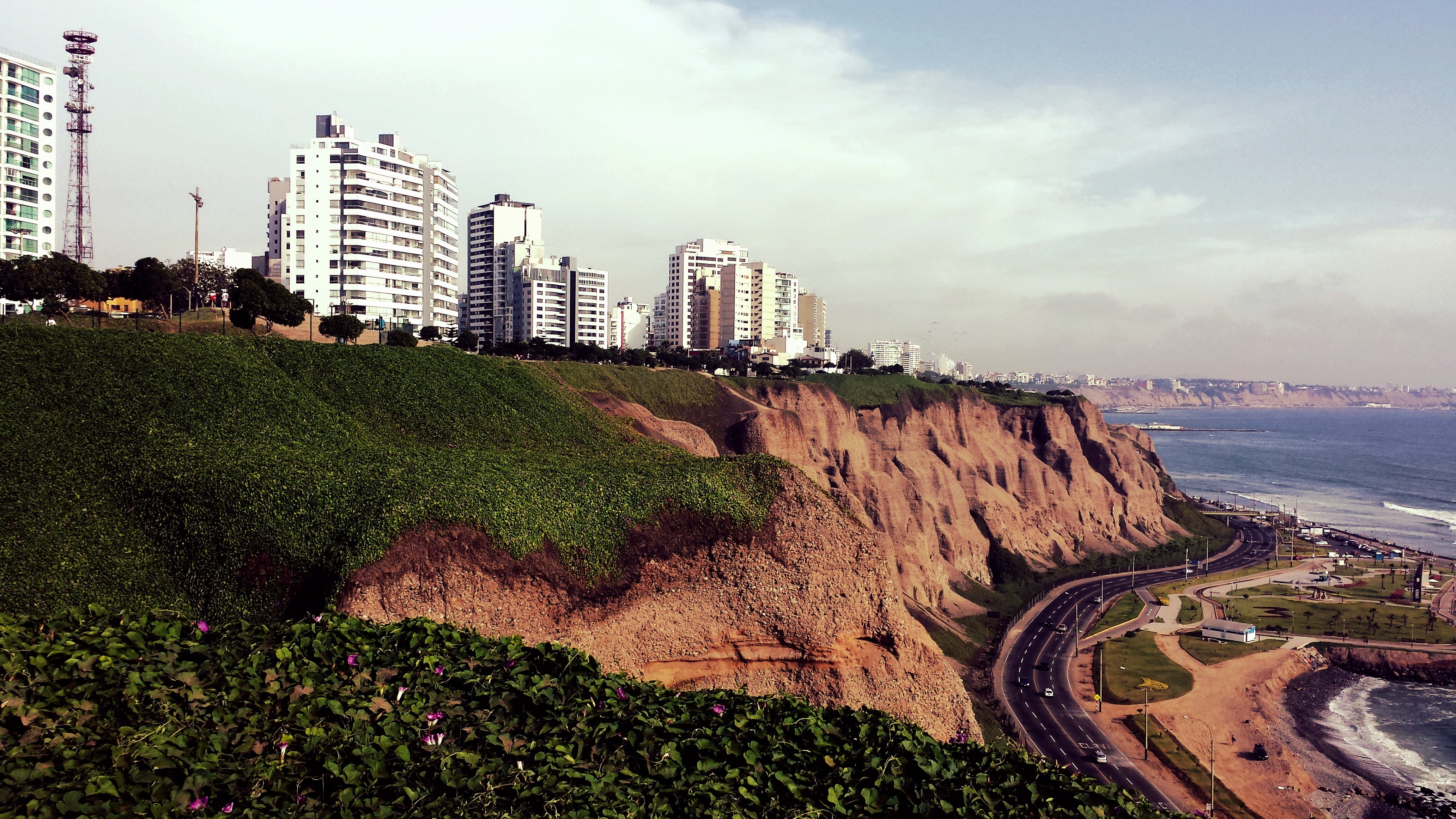 white high rise buildings and gray road at daytime, lima, peru