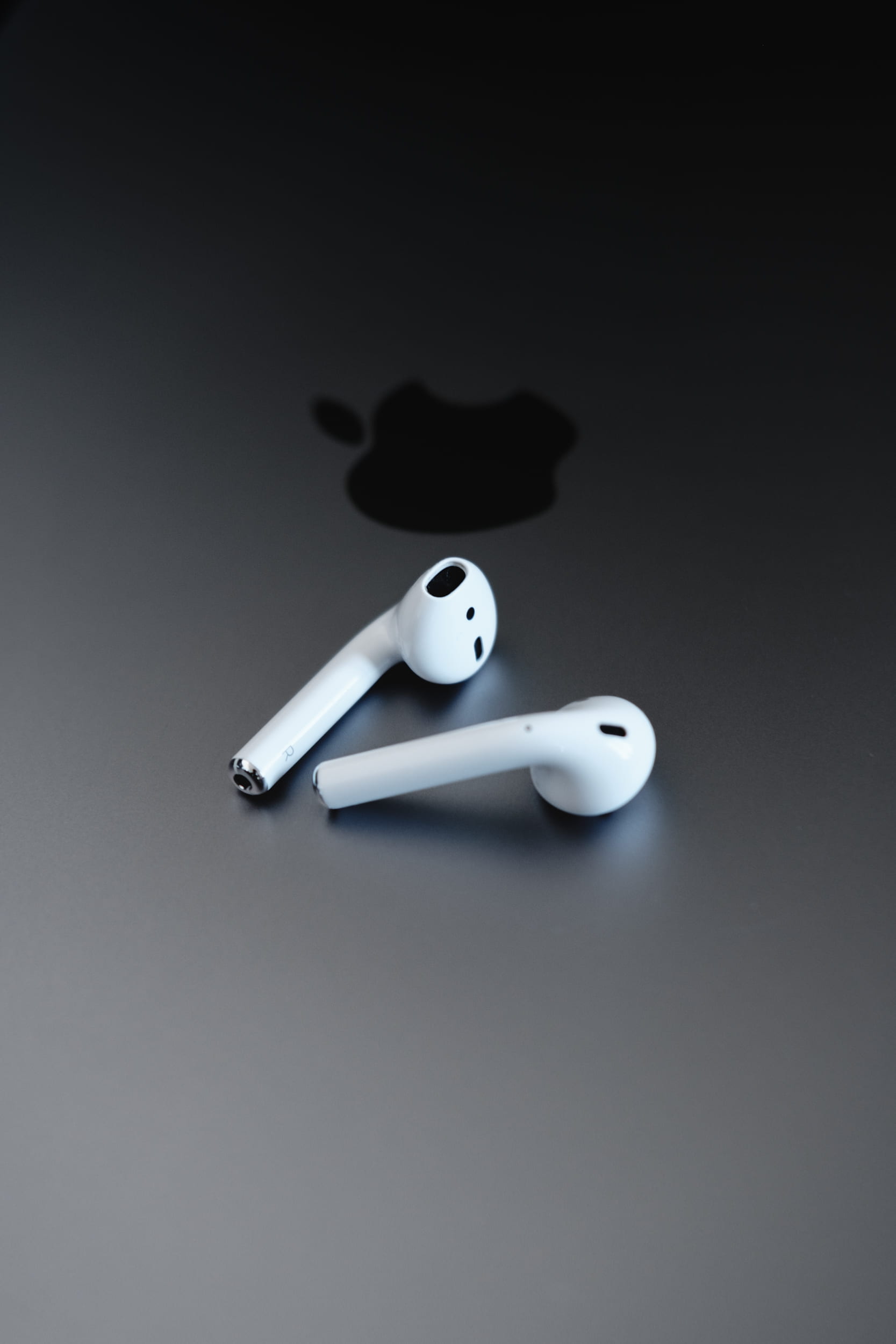 Apple EarPods on gray surface, Apple AirPods, earphone, gear