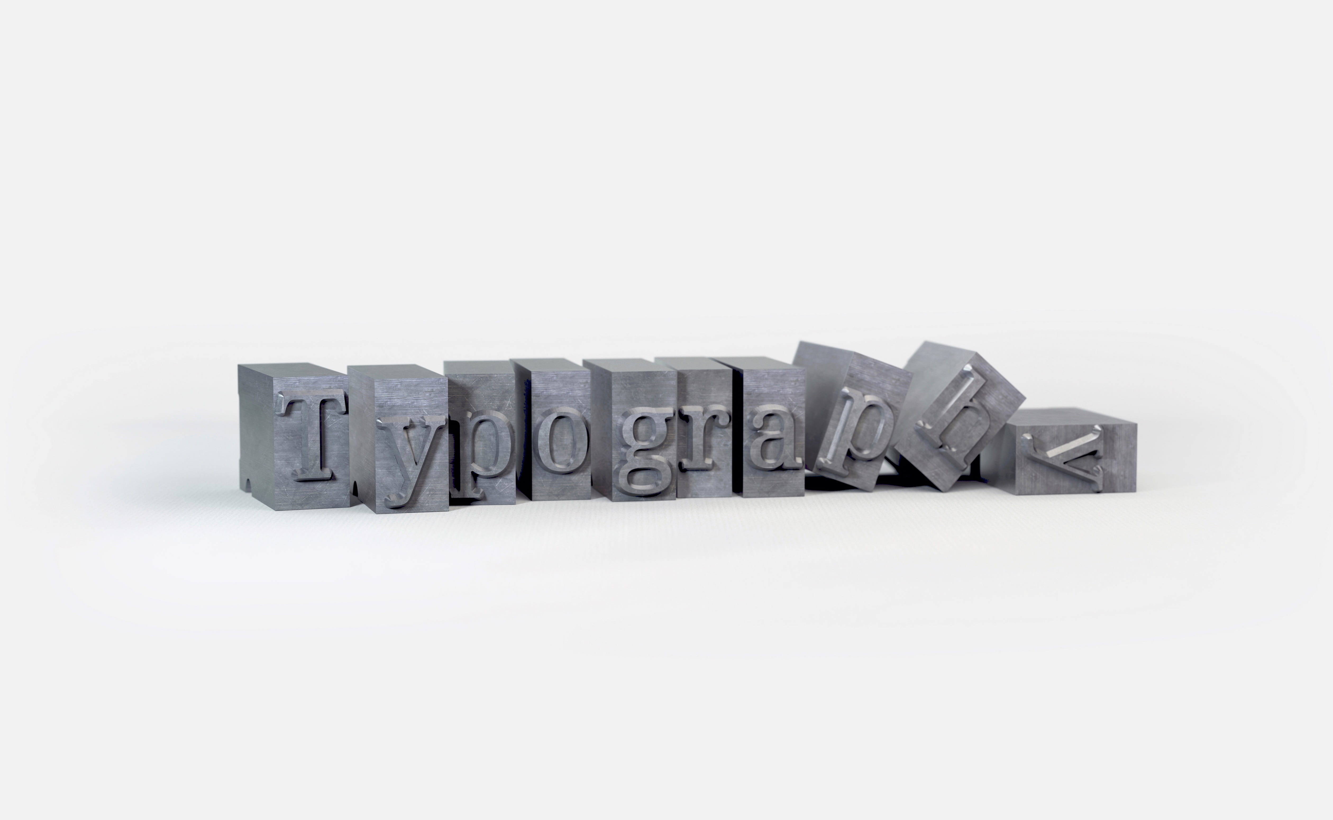 typography, blocks, objects, embossed, studio shot, indoors