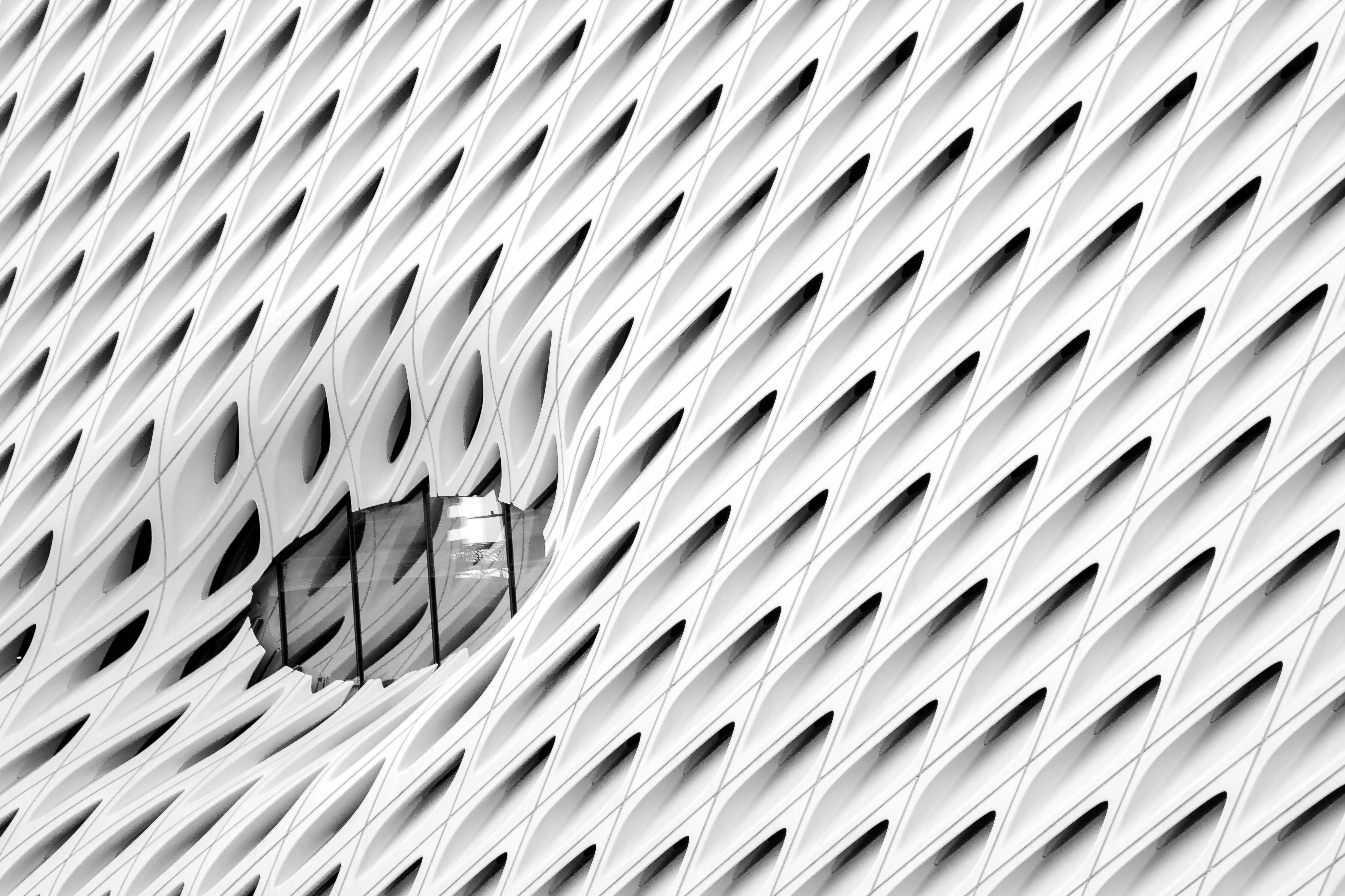 white textile, white perforated surface artwork, building, architecture
