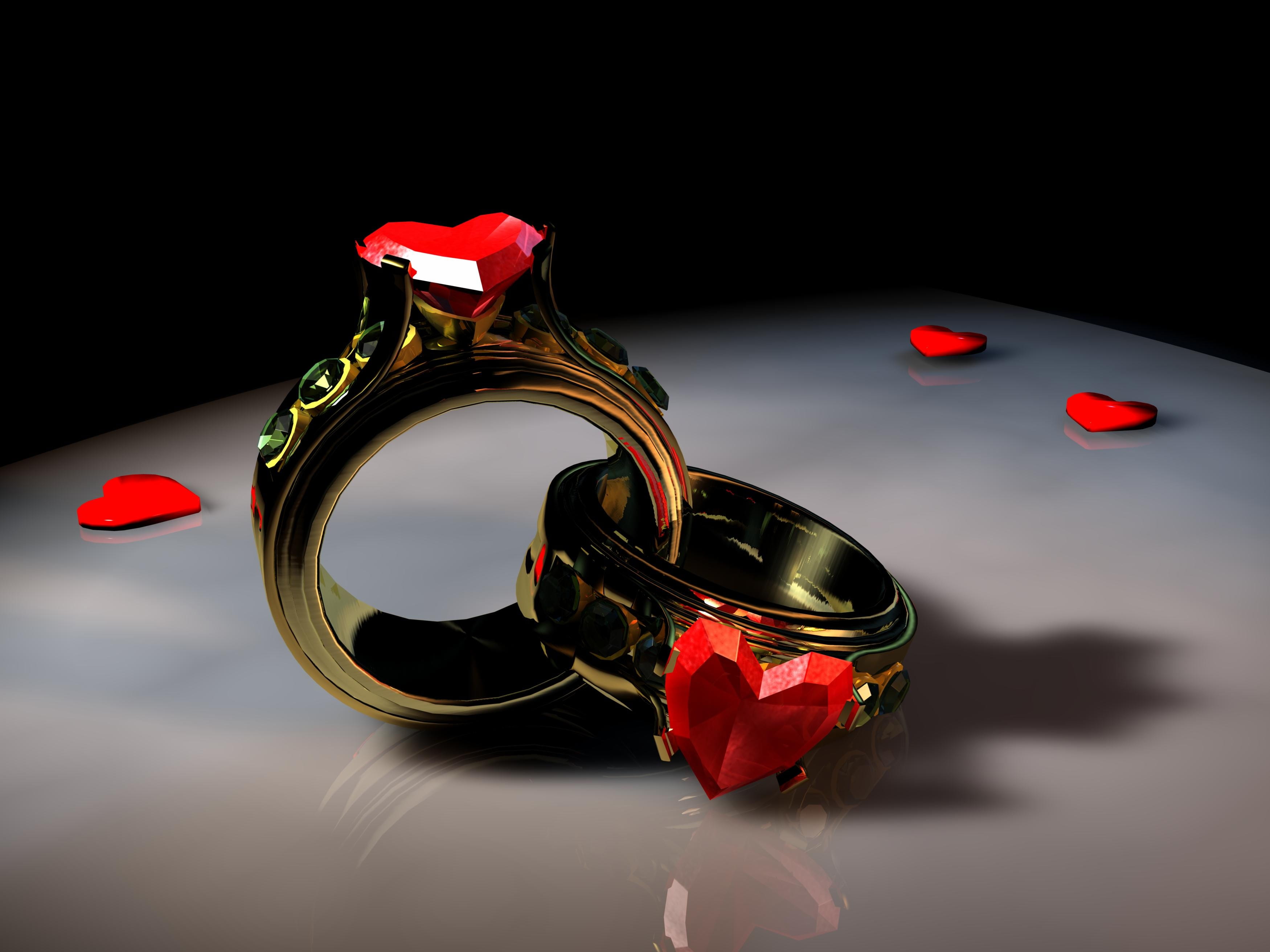 close-up photo of gold-colored couple rings, heart, love, symbol