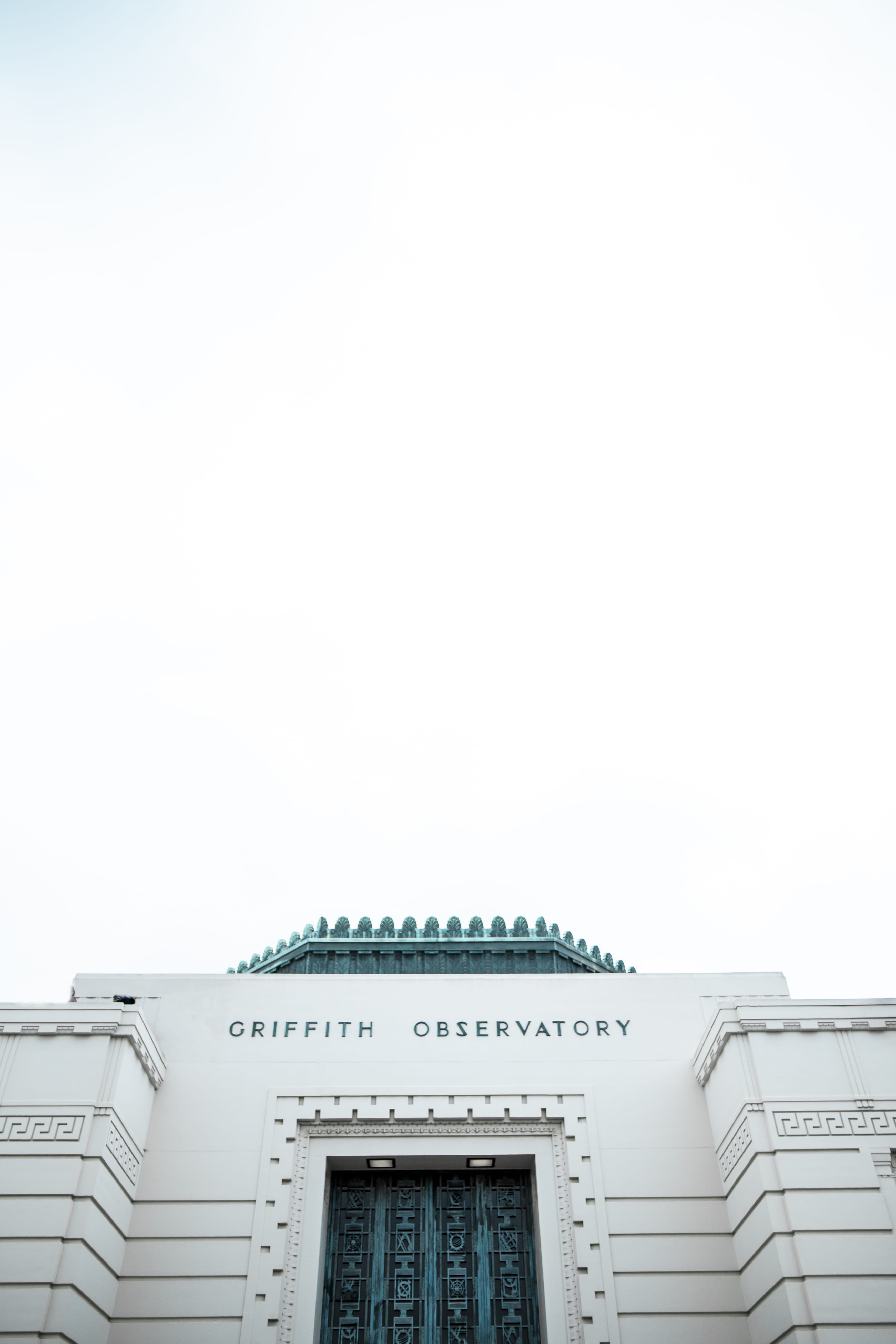 low angle photo of Griffith Observatory, Griffin Observatory building