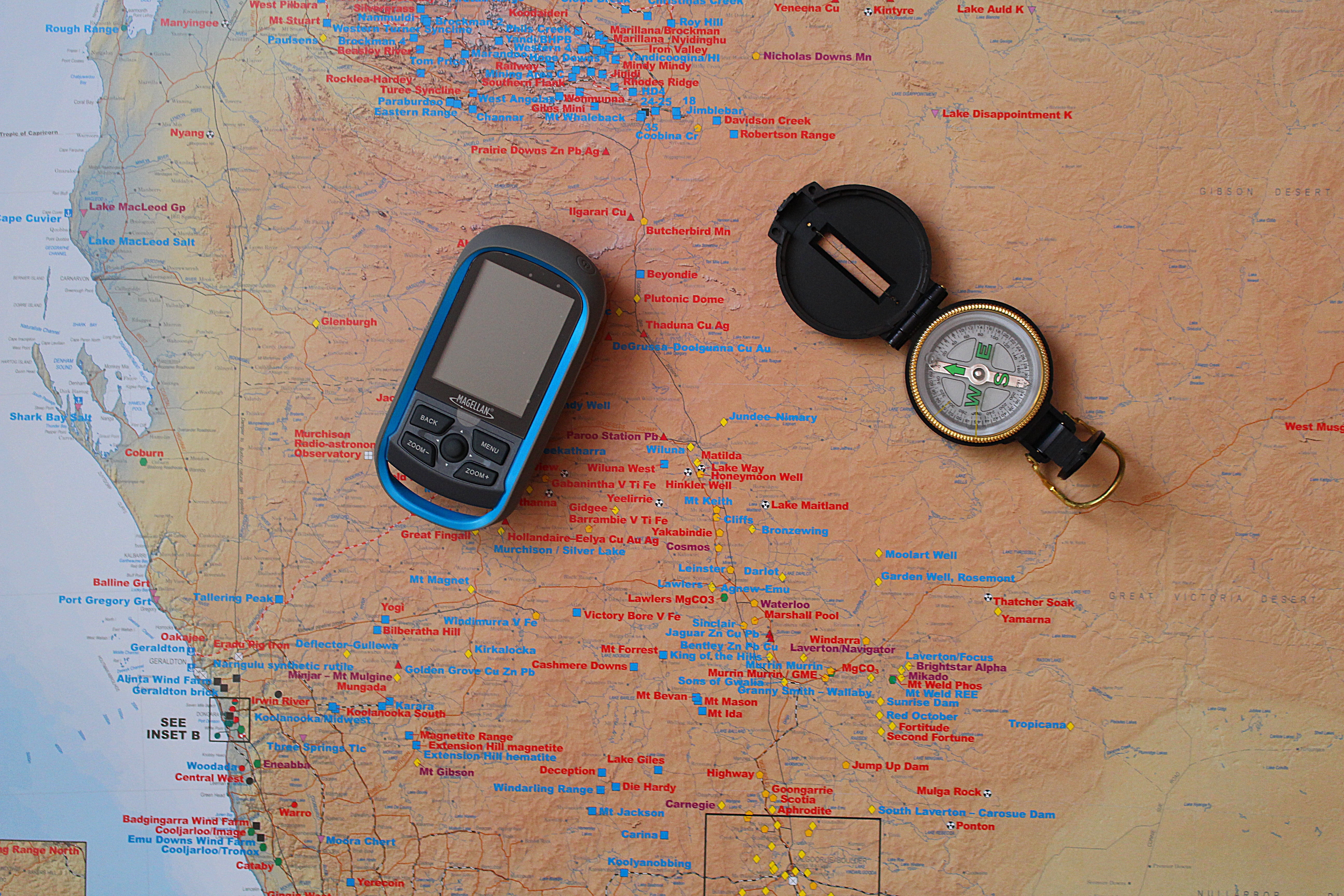 compass, map, navigation, navigation device, indoors, no people