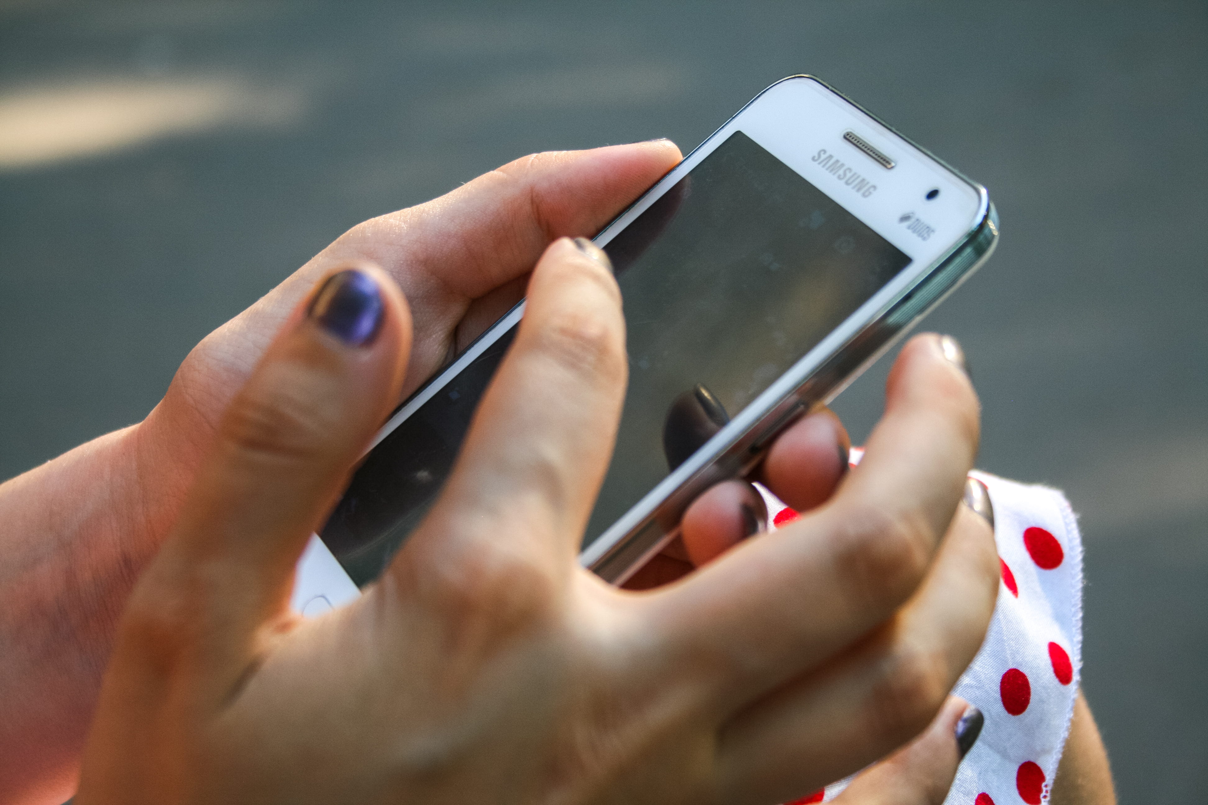 Human Hand Holding White Samsung Duos Android Smartphone, android phone
