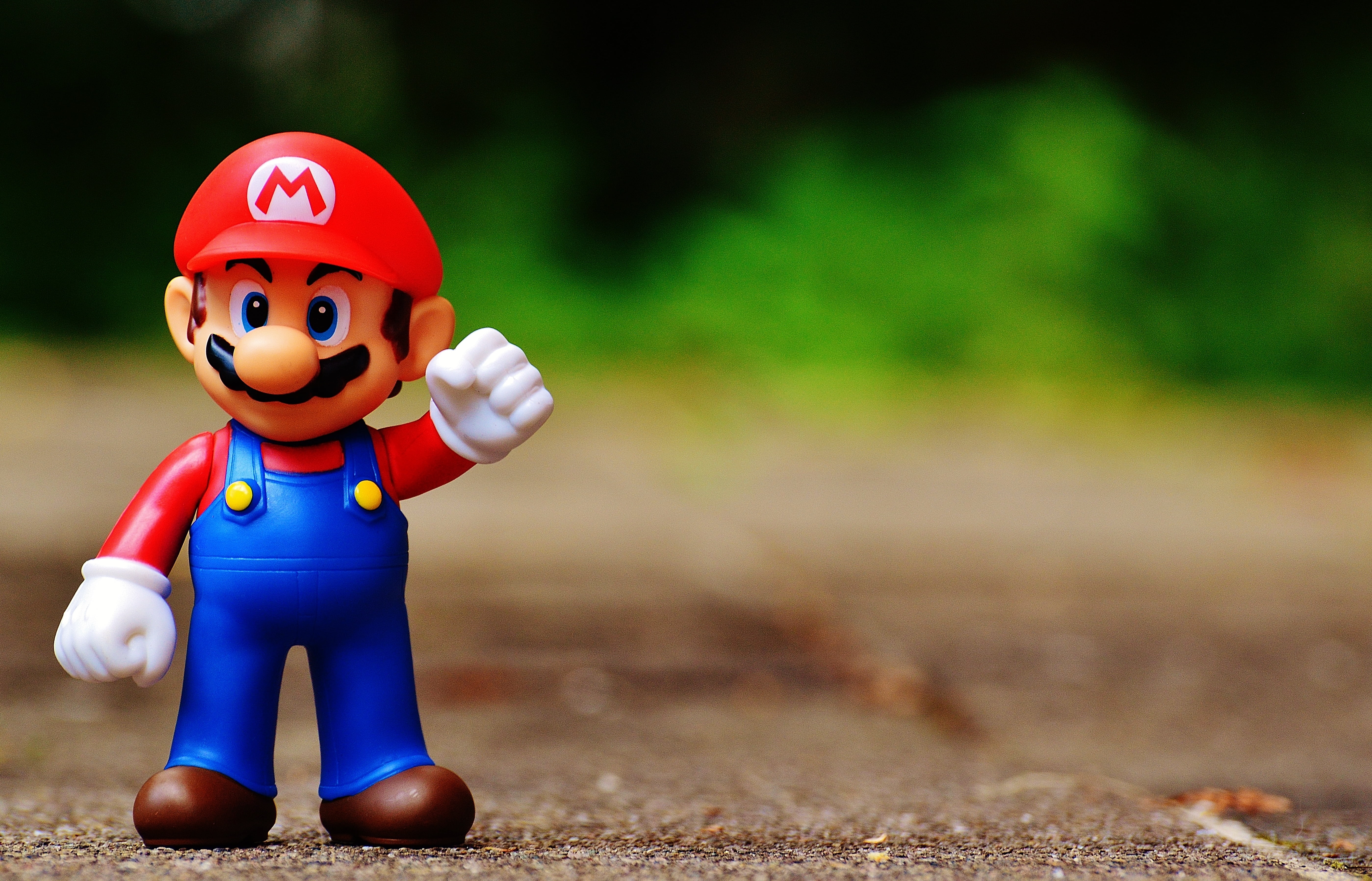 shallow focus photography of Mario toy, figure, play, nintendo