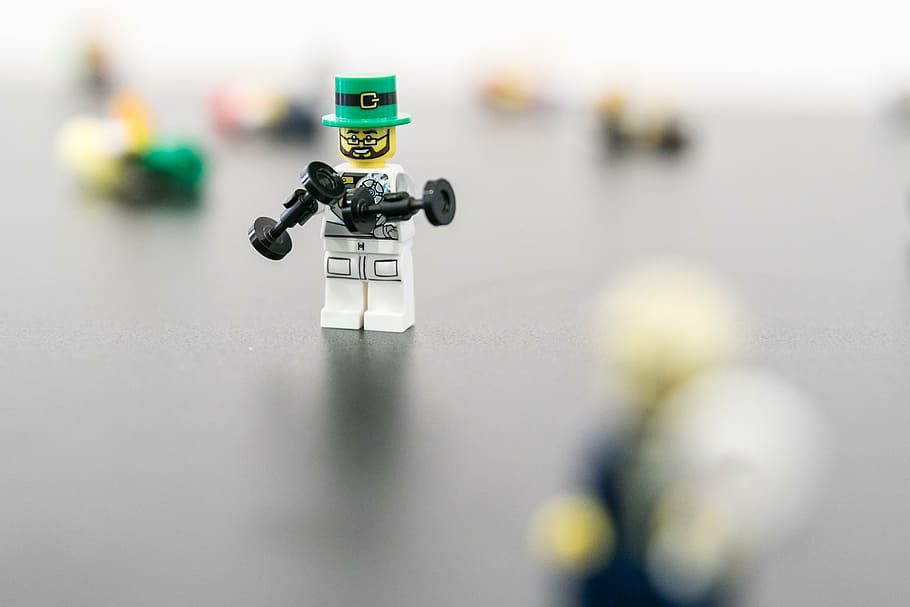 selective focus photography of LEGO minifigurine, executive HD wallpaper