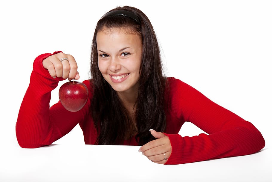 girl in red sweater smiling and holding an apple, cute, diet, HD wallpaper