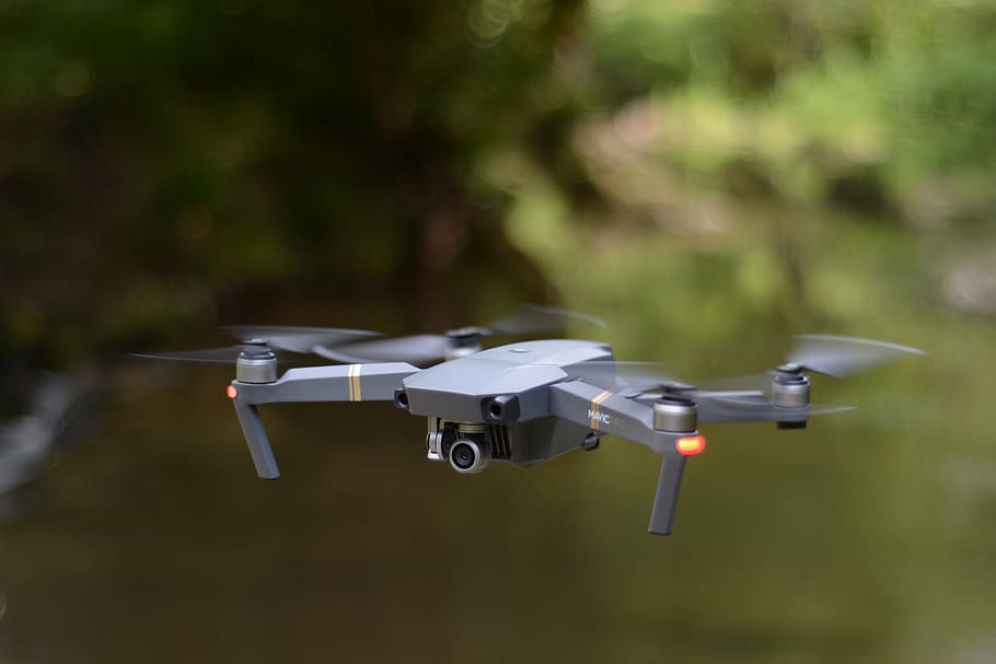 drone, camera, motion, flying, no people, focus on foreground HD wallpaper