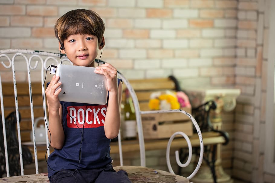 boy holding silver tablet computer, Korean, Child, Device, headphones HD wallpaper