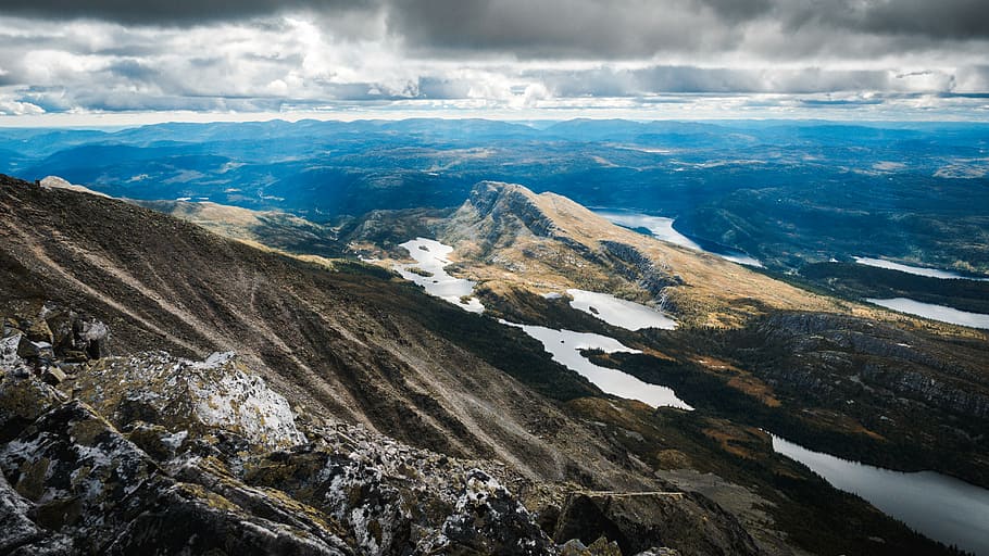 aerial photography of brown mountains beside blue sea, aerial photo of mountain HD wallpaper