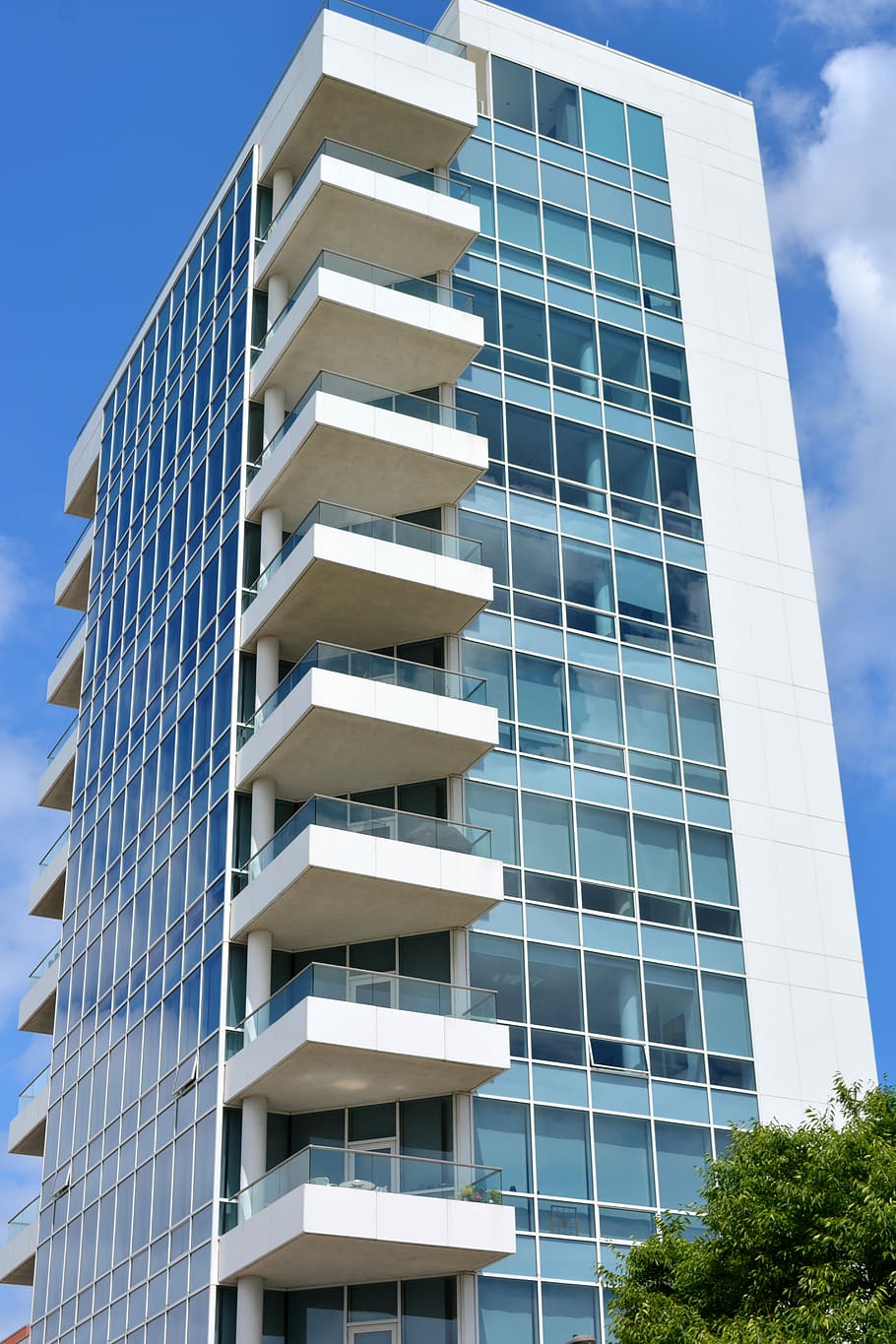 low-angle photo of white concrete curtain-wall building, Apartment Building