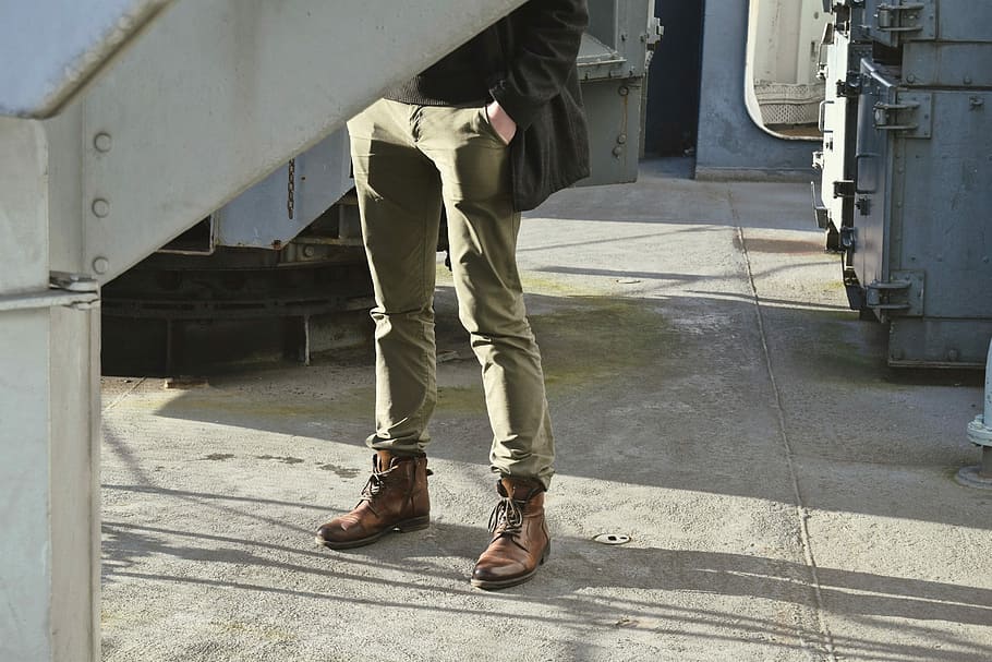 man standing wearing green jeans and brown shoes, men, people HD wallpaper