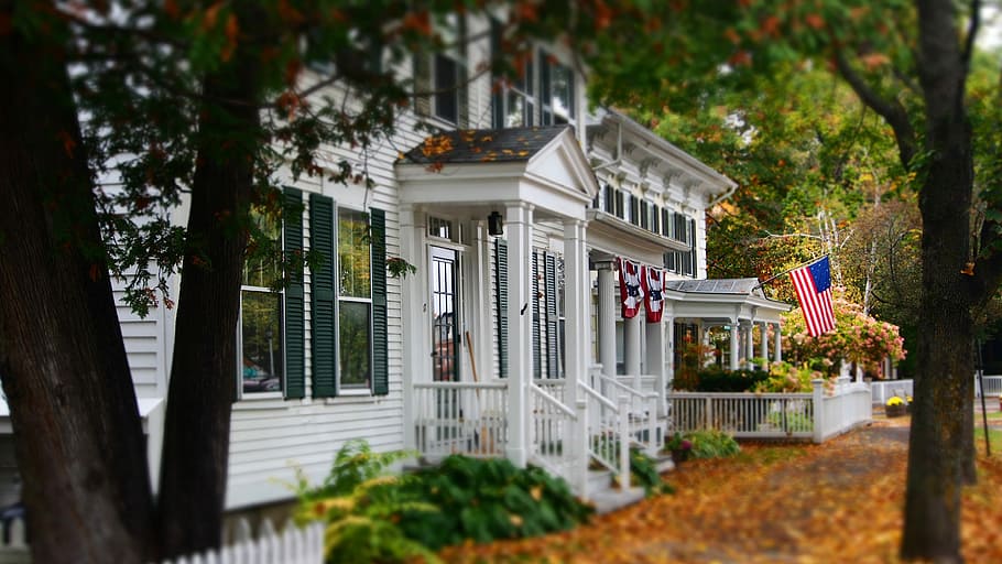 white and gray wooden house with US flag, USA flag hanging outside house HD wallpaper