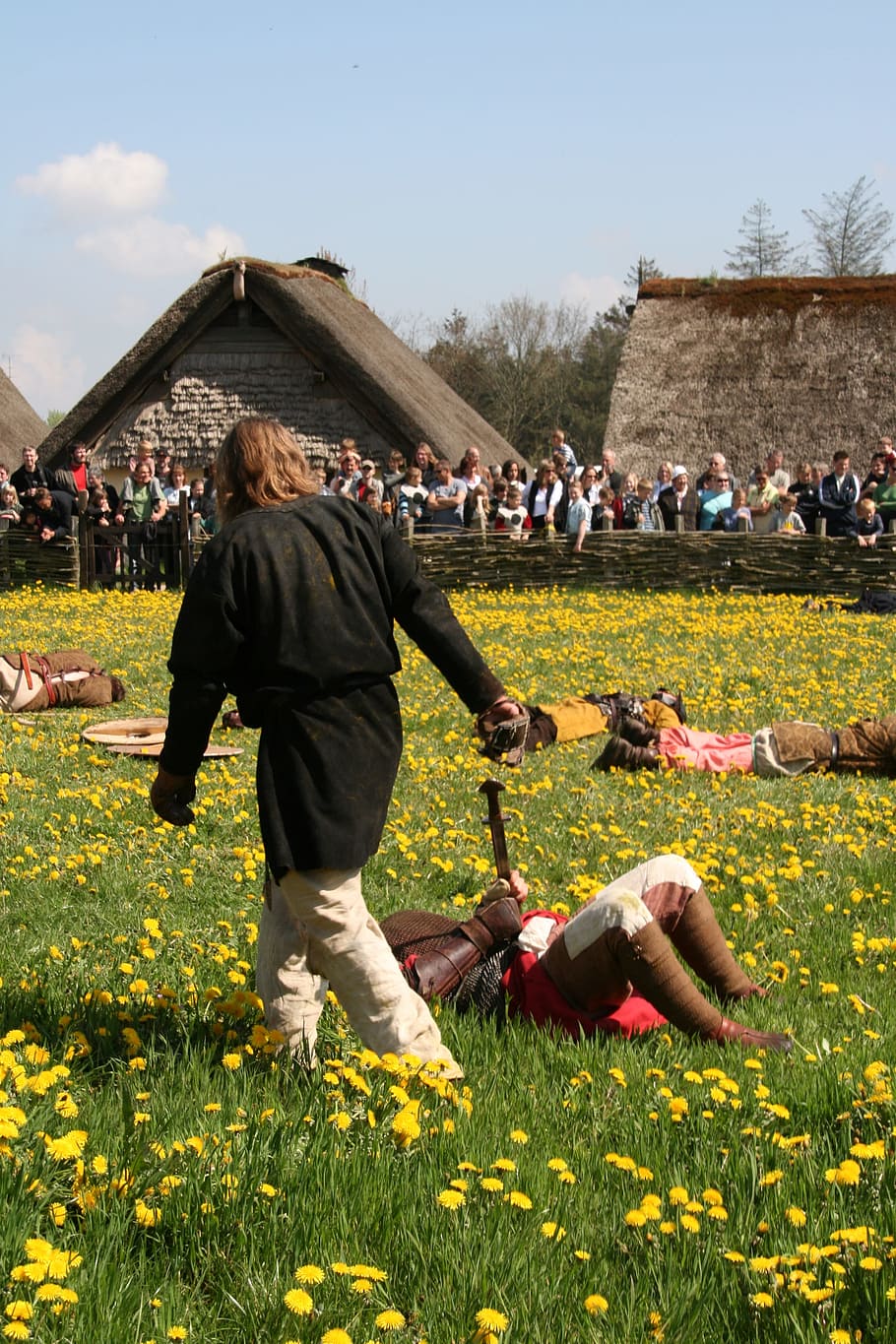 landscape, people, field, flowers, actors, audience, costumes HD wallpaper