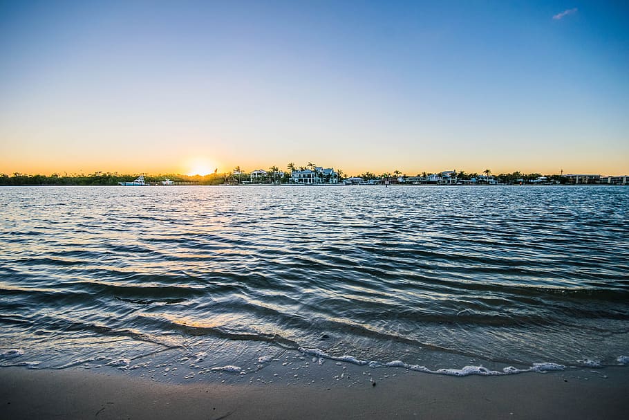 sunset, water, sky, ocean, coast, wave, evening, tranquility HD wallpaper