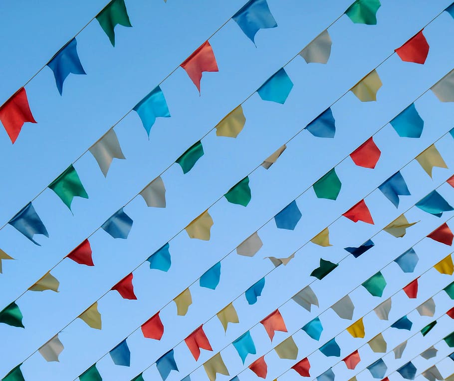 low-angle photography of assorted-color pennant banner lot, low-angle photography of assorted-color buntings HD wallpaper