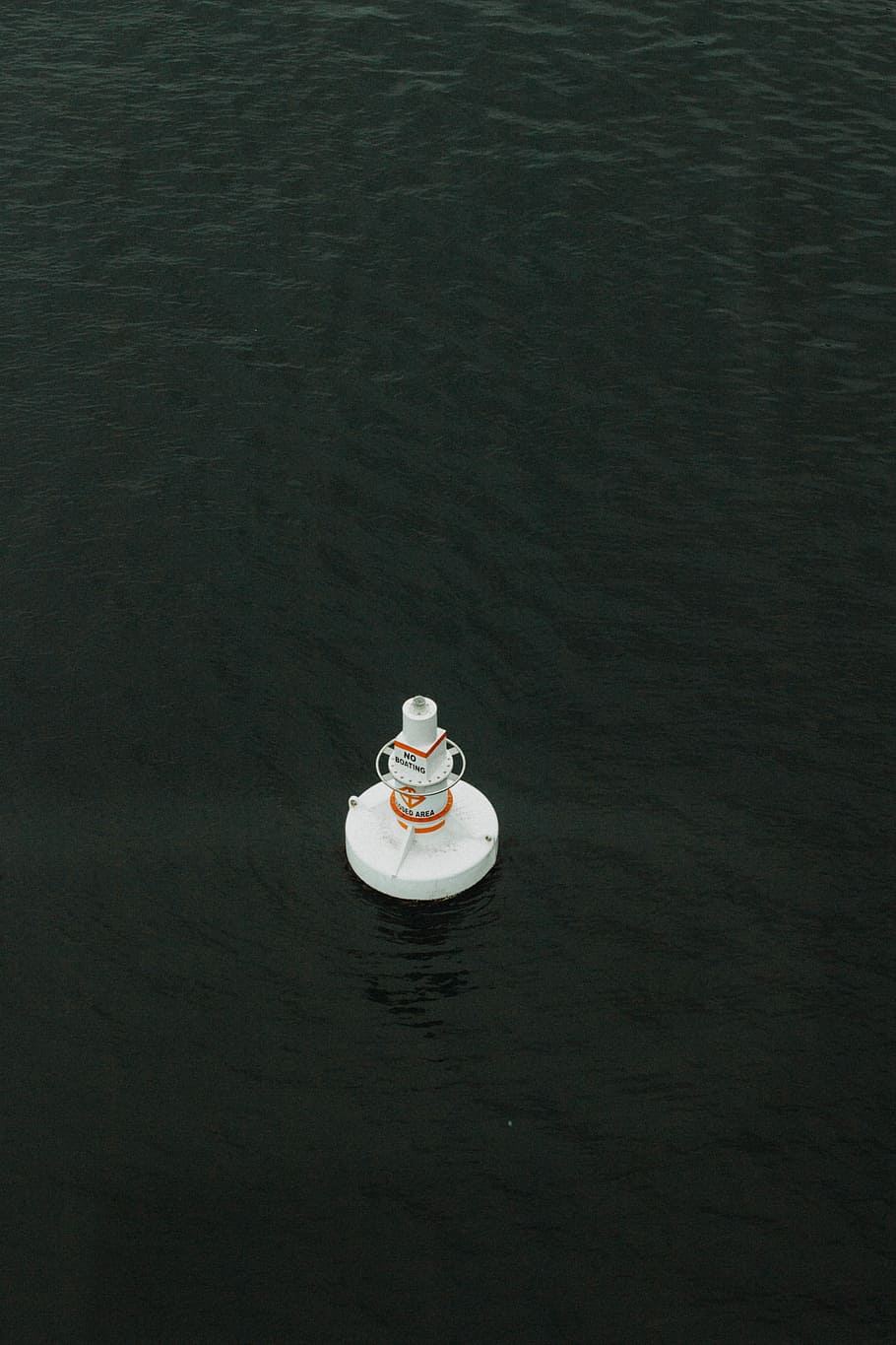 round white ornament on top of body of water floating, white floater on sea HD wallpaper