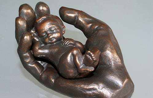 baby lying human palm figurine, Hand, Child, Bronze Statue HD wallpaper