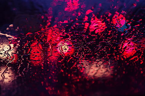 Abstract shot of rain and lights through glass texture window HD wallpaper