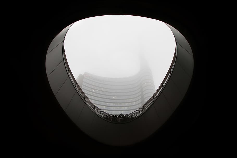 low angle photography of building at daytime, low-angle photography of a concrete high-rise building view from a building balcony view HD wallpaper