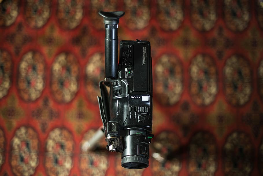 black camcorder, selective focus photography of black Sony camcorder HD wallpaper