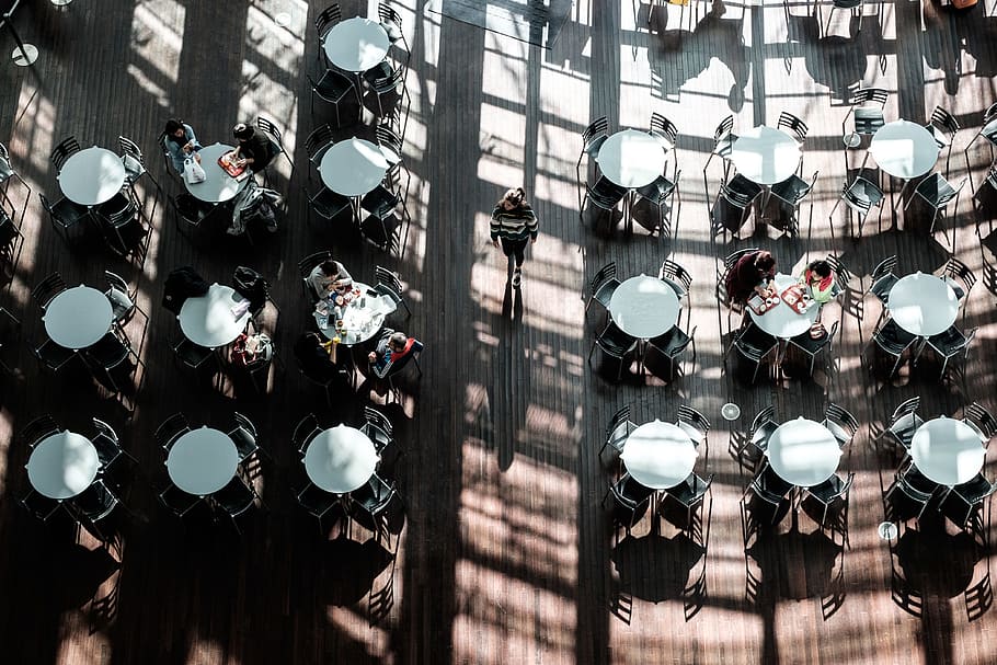 people sitting at table inside restaurant, bird's eye view photo of people sitting on chair HD wallpaper