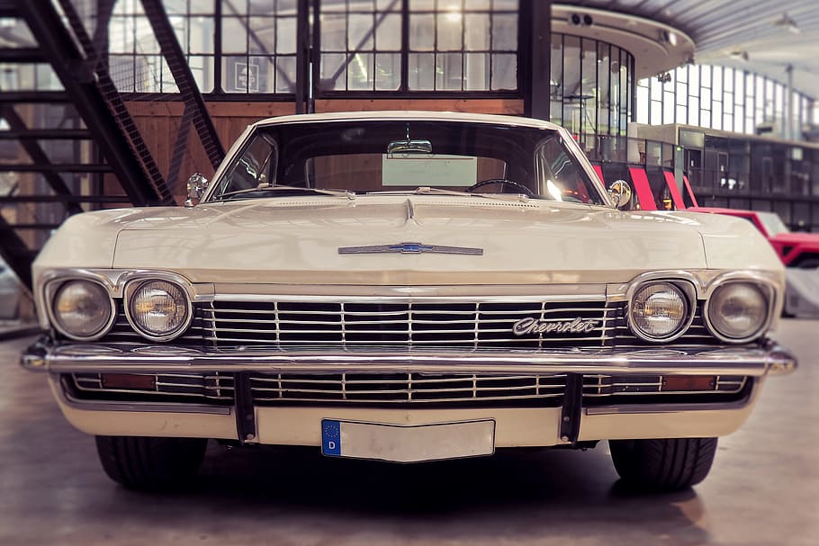 classic beige Chevrolet car parked inside building, auto, vehicle