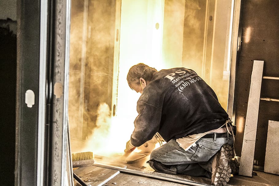 man kneeling on floor while cutting tiles, construction, welding HD wallpaper