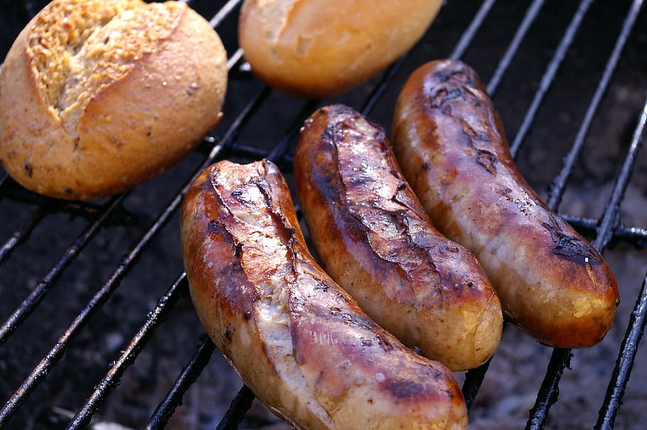 grilled sauges and two breads on outdoors, grilled meats, barbecue