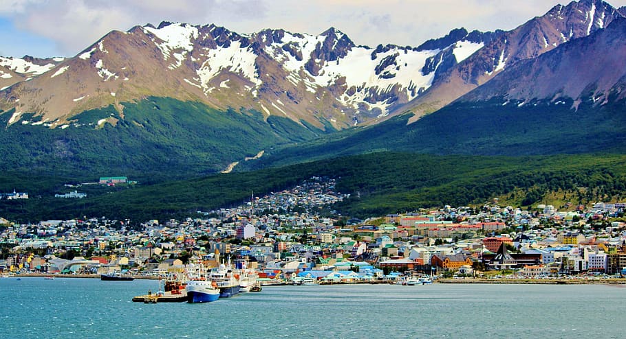 photo of ship on body of water near city and mountains, ushuaia, HD wallpaper