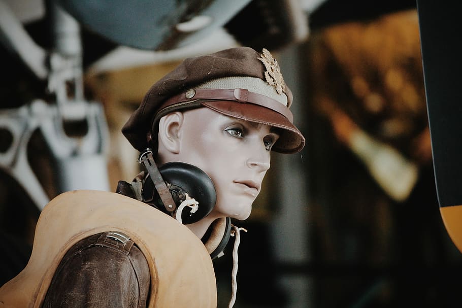 person wearing headphones and cap, mannequin wearing aviation headset and brown peaked cap and vest HD wallpaper