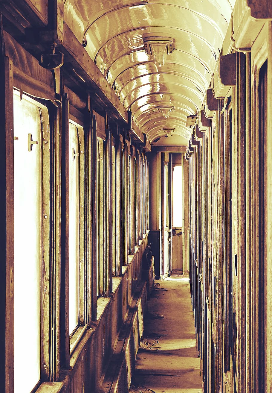 brown wooden photography during daytime, trains, train cemetery