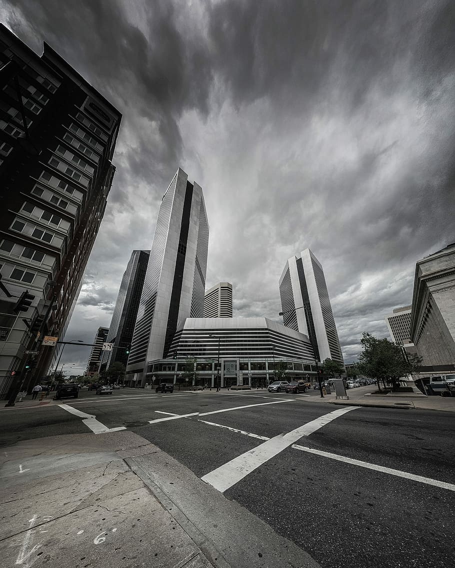 grayscale photo of buildings and rodas, low angle photography of high-rise building structure HD wallpaper