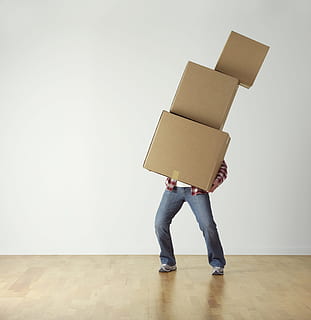 person wearing red shirt carrying three brown boxes, cardboard HD wallpaper