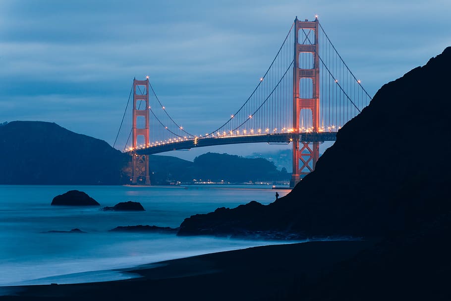 lighted red metal bridge, golden, gate, landmark, structure HD wallpaper