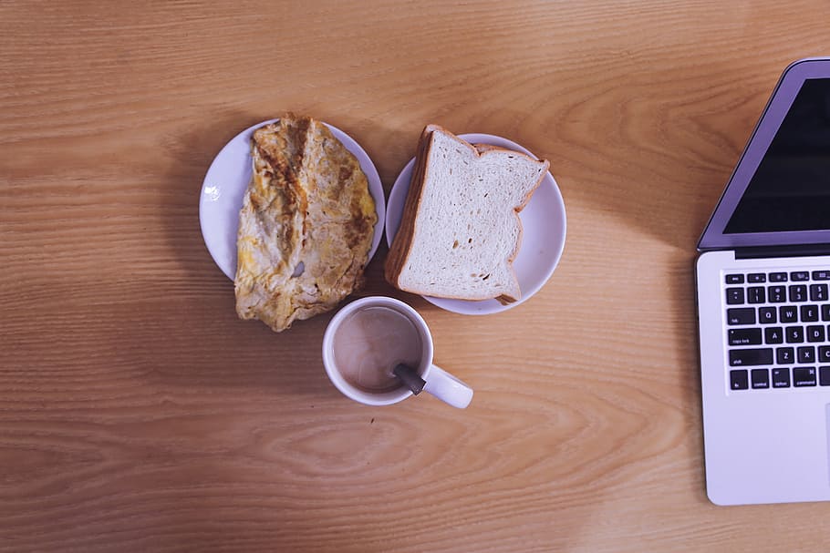 bread and roti on plate near coffee filled mug, photo, breakfast