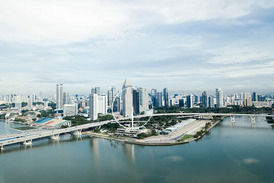 white ferris wheel near highway, aerial view photography of city during daytime HD wallpaper