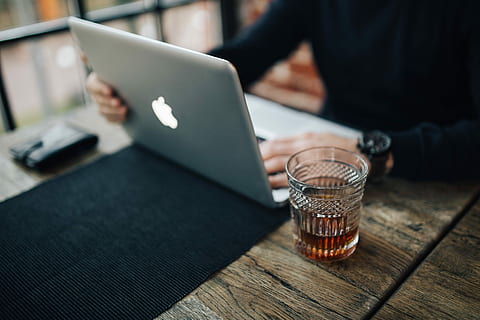 Young Entrepreneur Working from a Modern Cafe, interior, workspace HD wallpaper